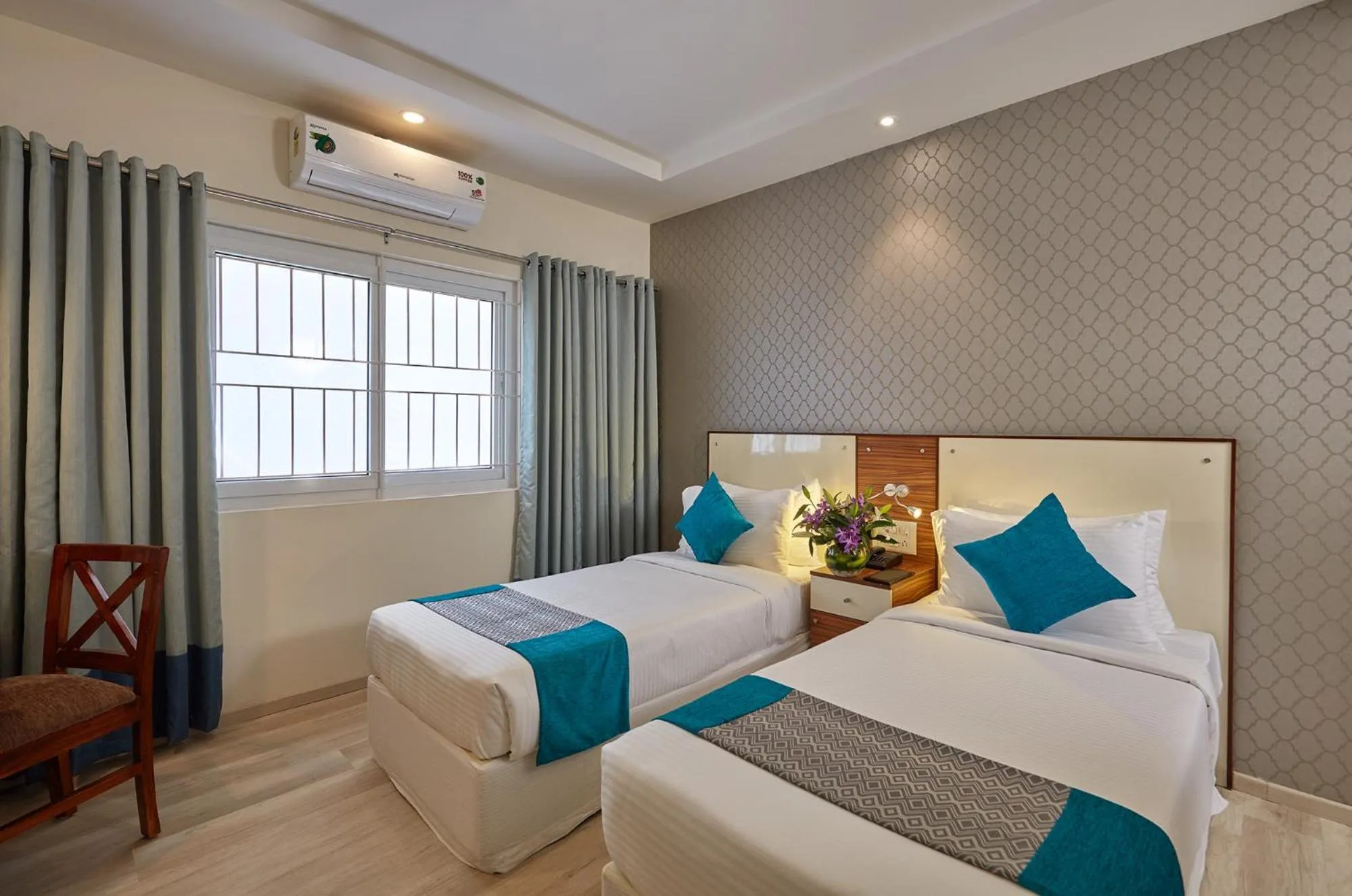 Bedroom, Bed in Regenta Inn Indiranagar by Royal Orchid Hotels
