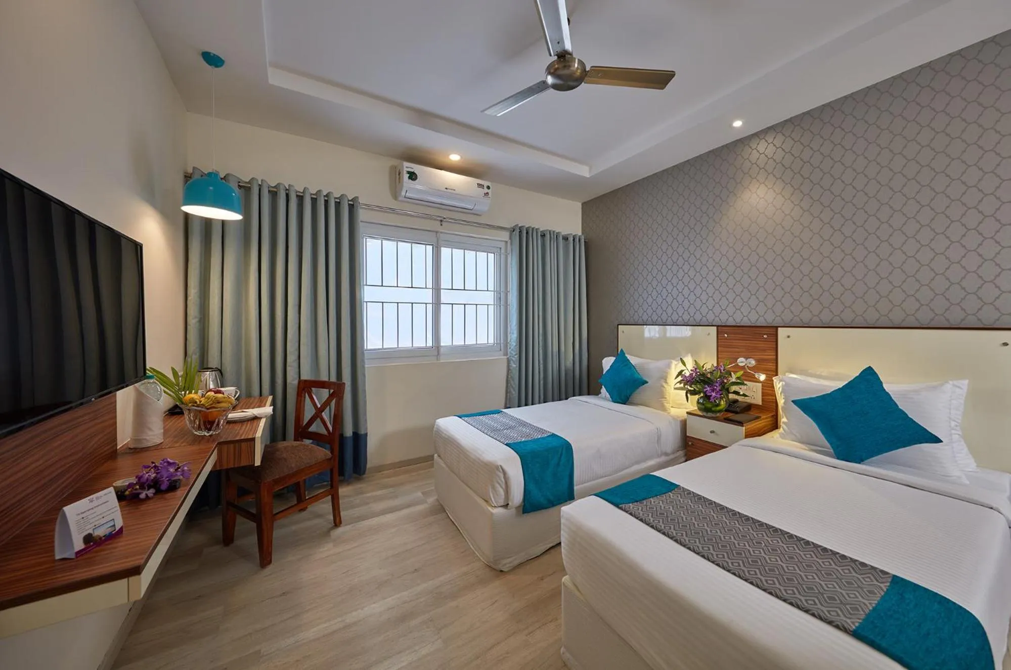 Bedroom, Bed in Regenta Inn Indiranagar by Royal Orchid Hotels