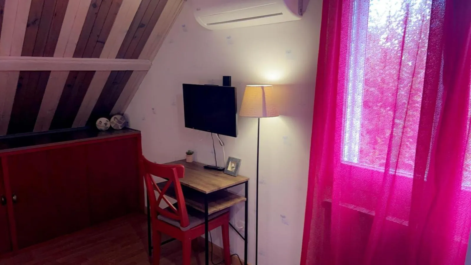 Communal lounge/ TV room in Domaine de la Borde