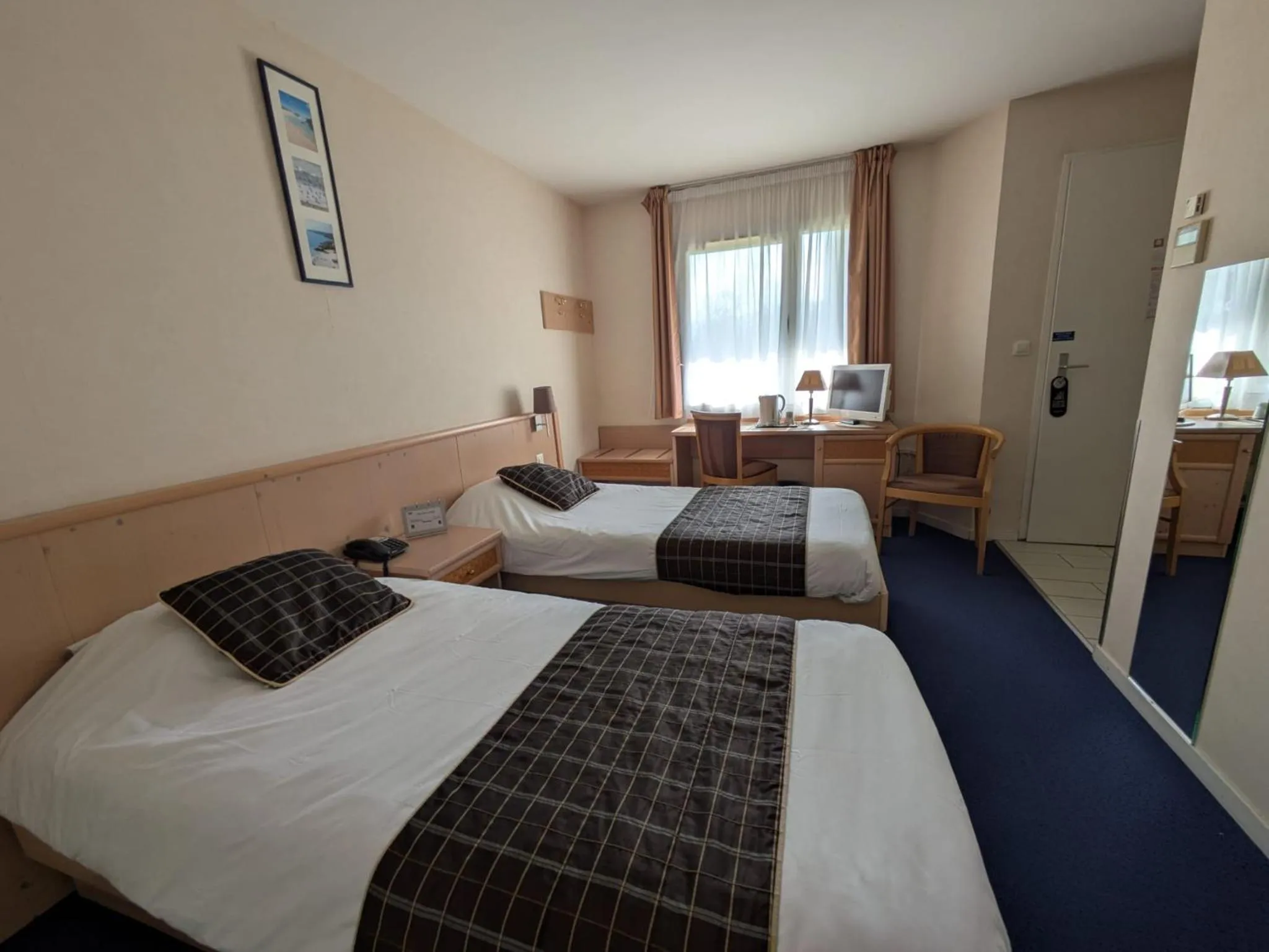 Bed in Hotel Anjou à L'Océane Angers-Le Mans