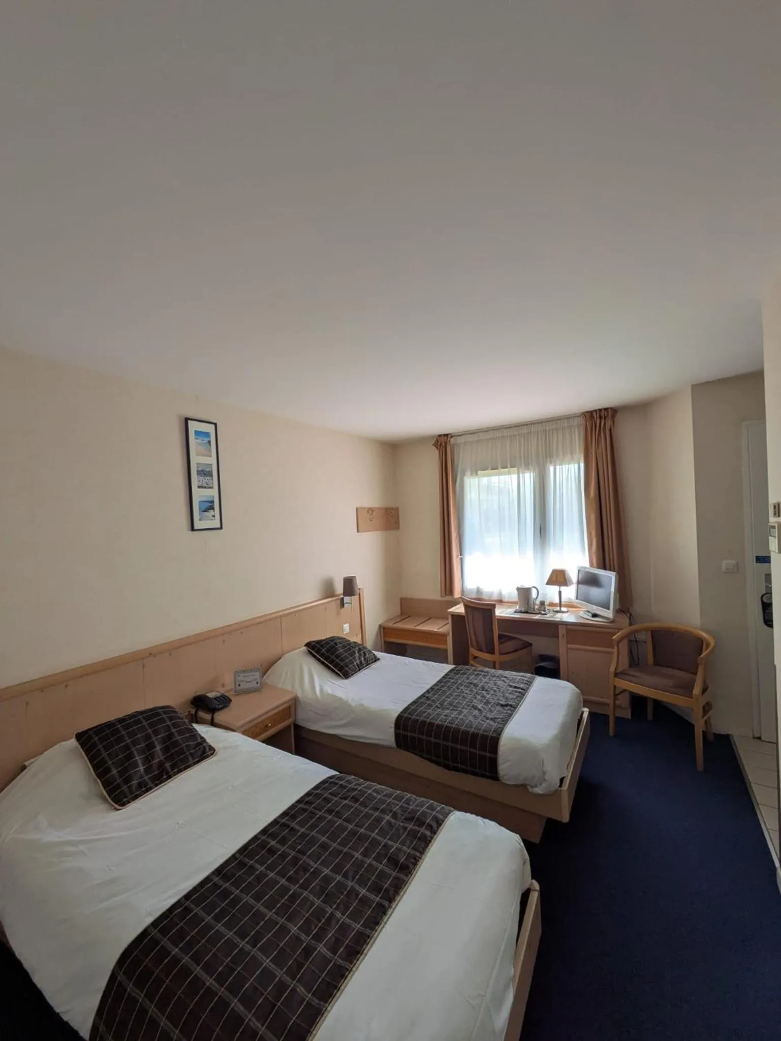 Bed in Hotel Anjou à L'Océane Angers-Le Mans