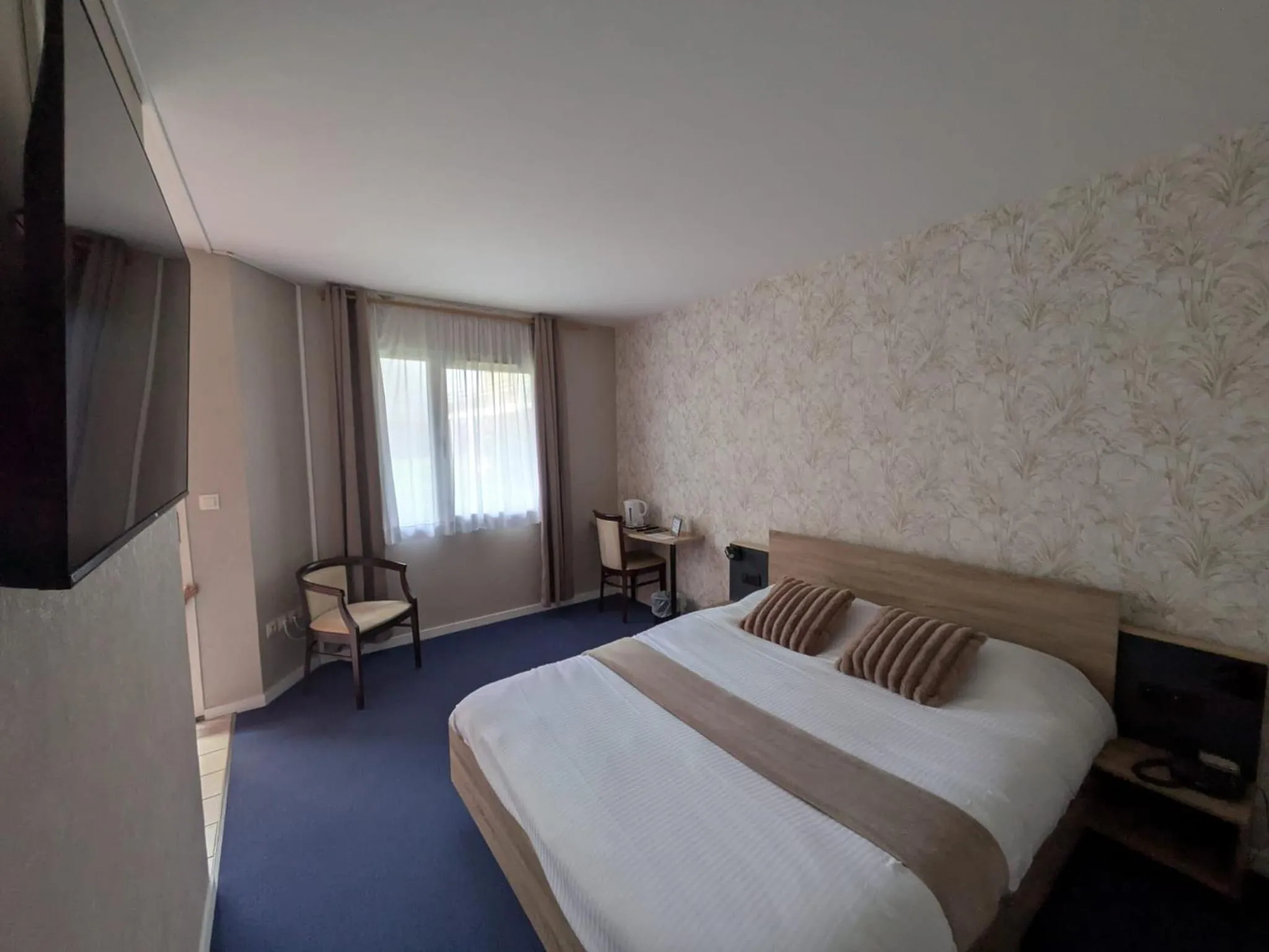 Bedroom, Bed in Hotel L'Océane Angers Parc Expo