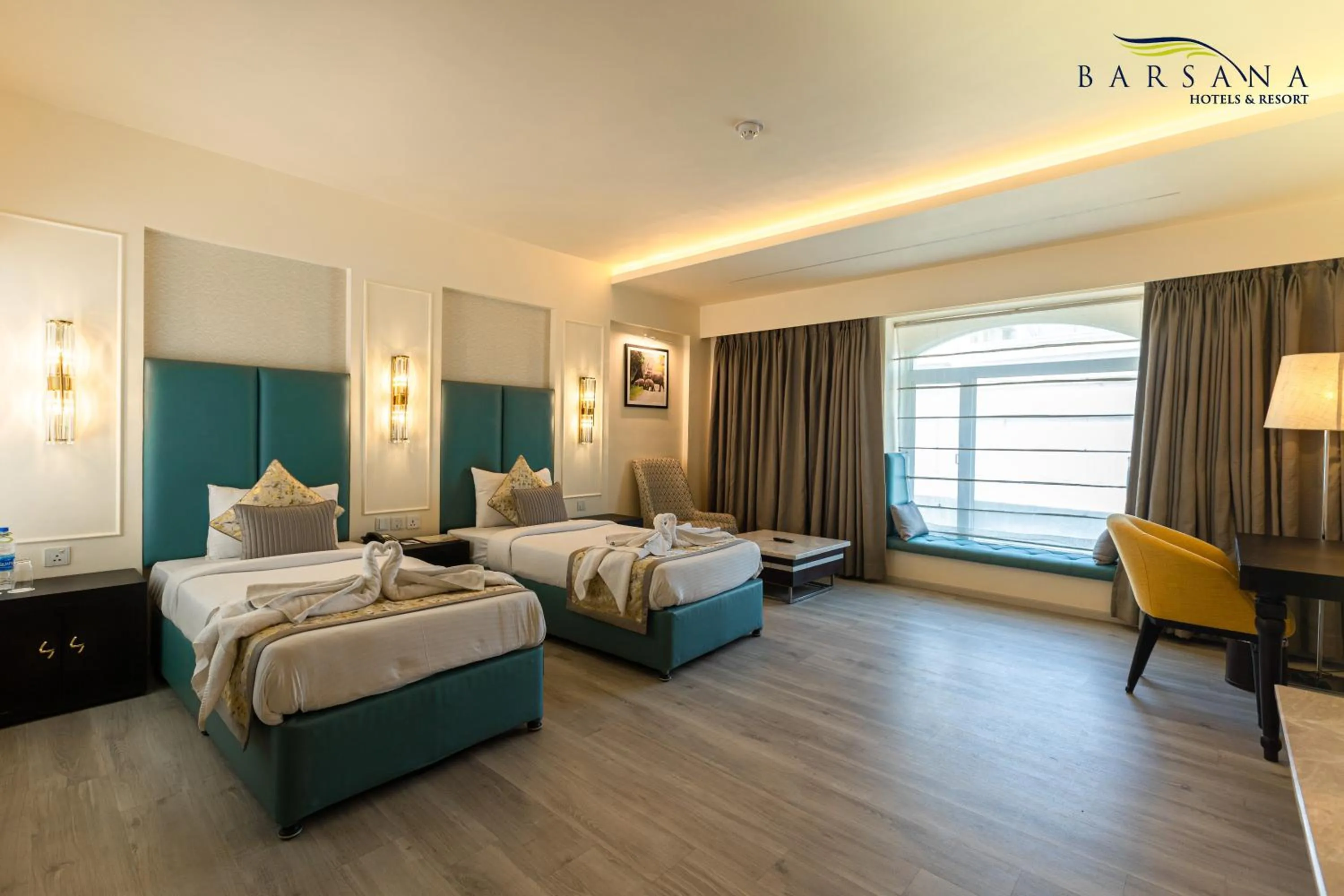 Photo of the whole room, Bed in Barsana Hotel & Resort Siliguri