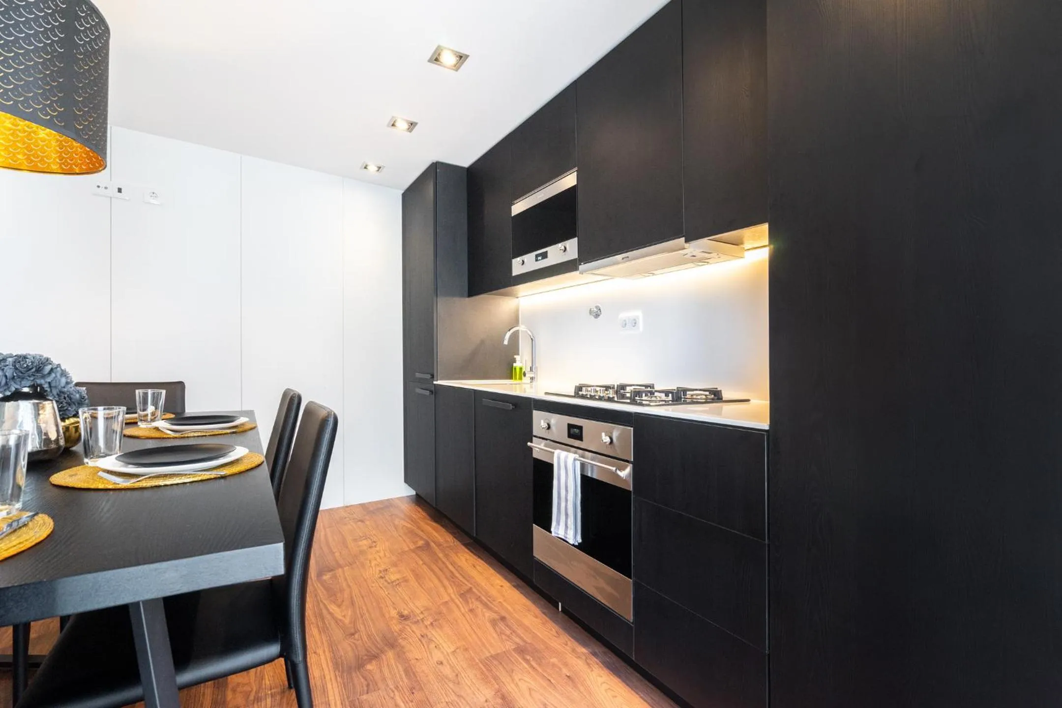 Kitchen or kitchenette in WHome | Graça Family Apartment