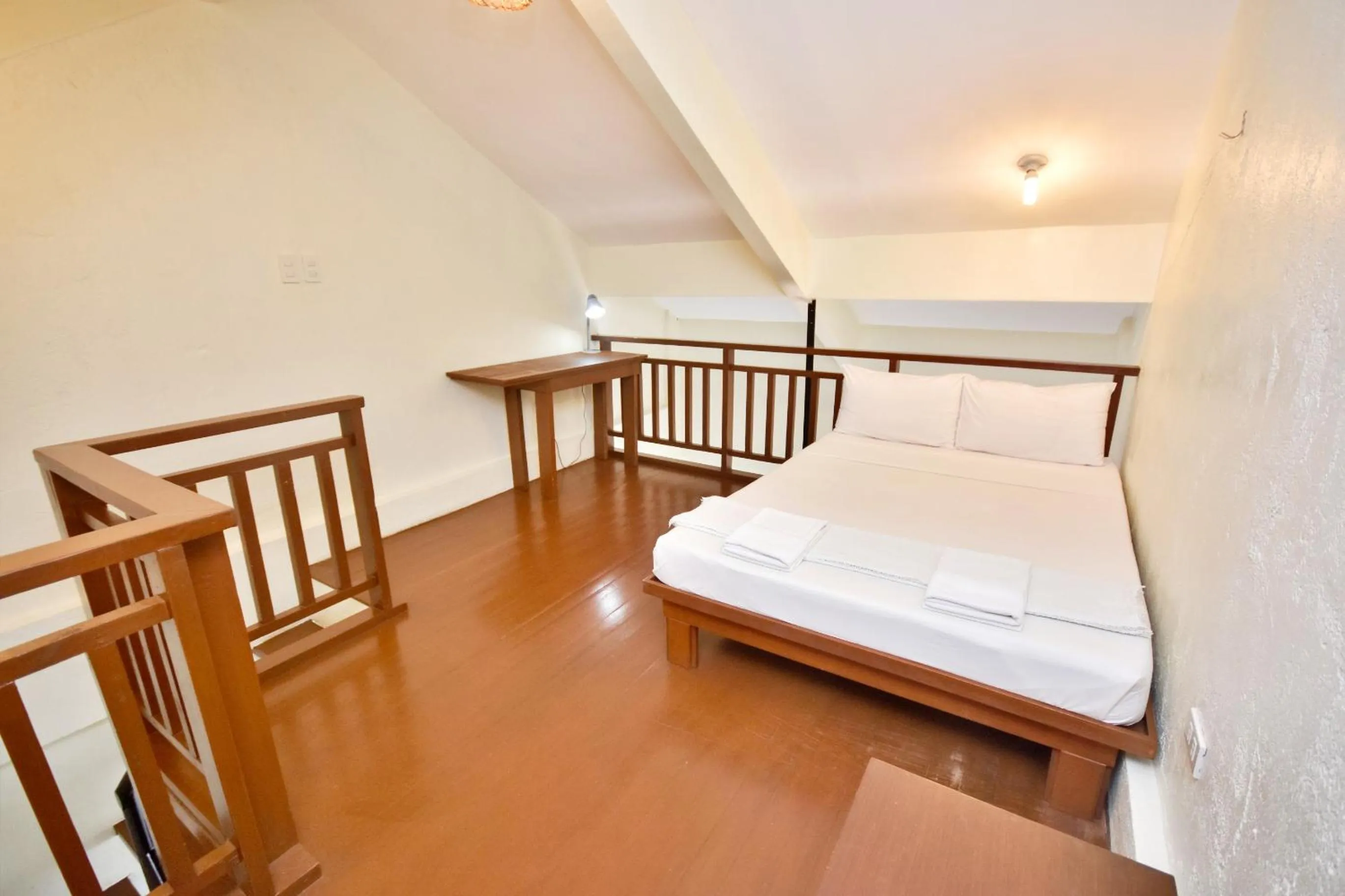 Photo of the whole room, Bed in Agos Boracay Rooms + Beds