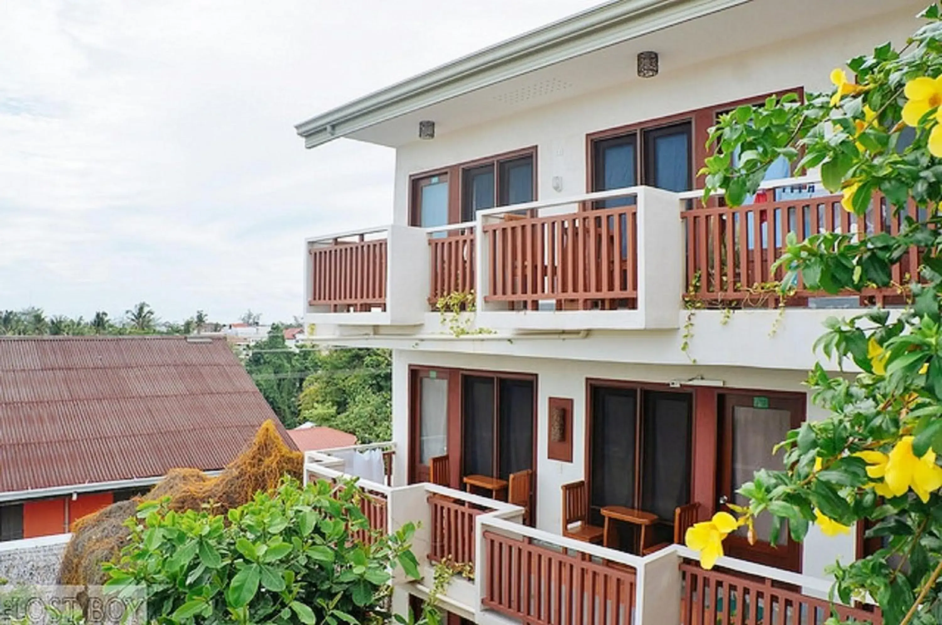 Property building in Agos Boracay Rooms + Beds Property building in Agos Boracay Rooms + Beds