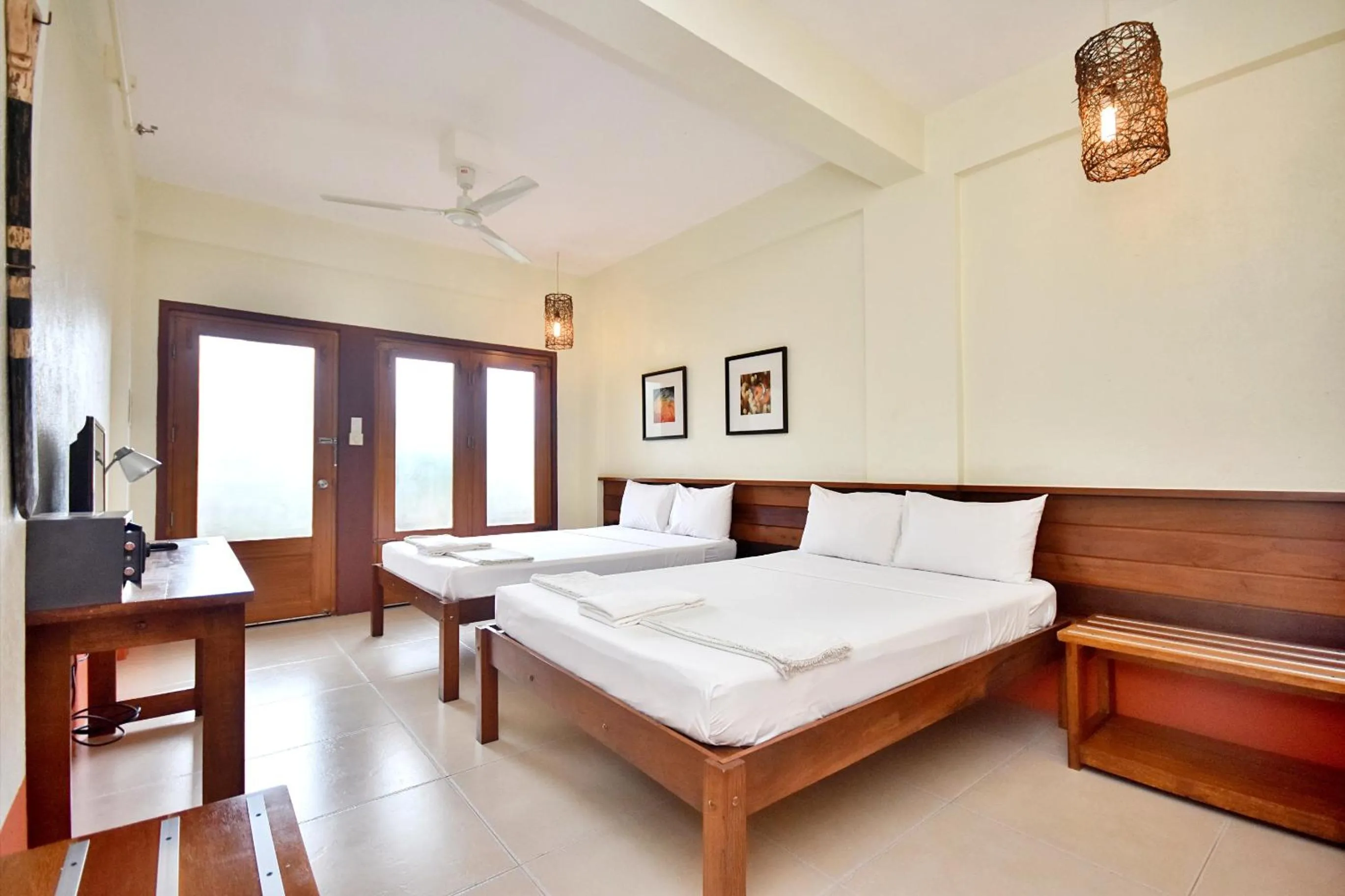 Photo of the whole room, Bed in Agos Boracay Rooms + Beds