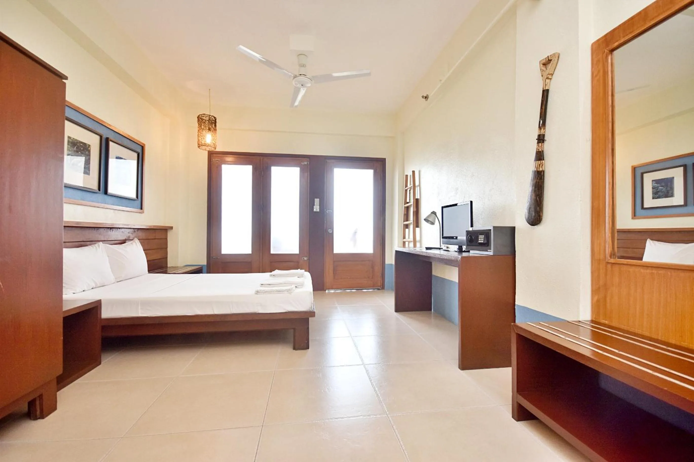 Photo of the whole room, Bed in Agos Boracay Rooms + Beds