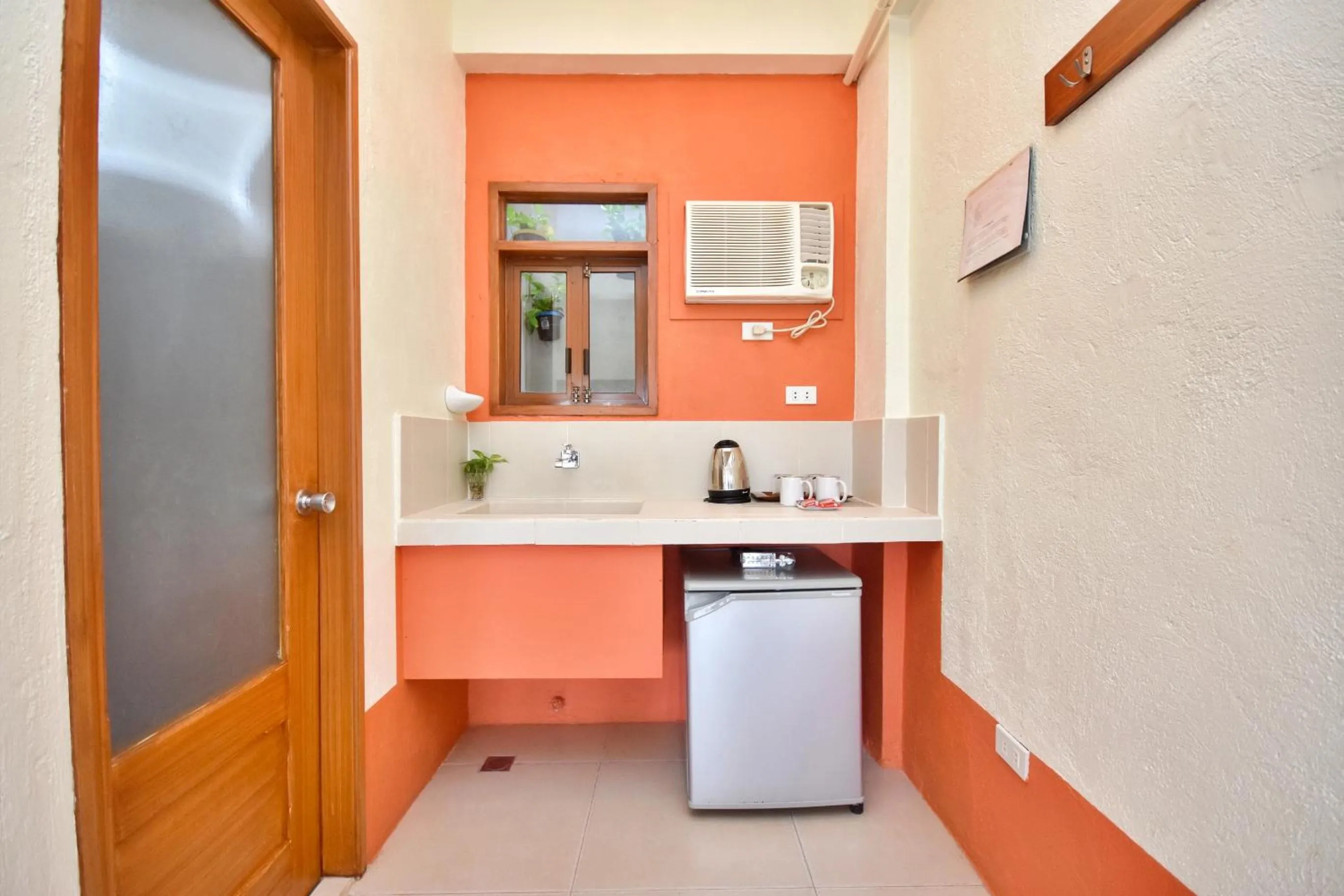 Kitchen or kitchenette in Agos Boracay Rooms + Beds