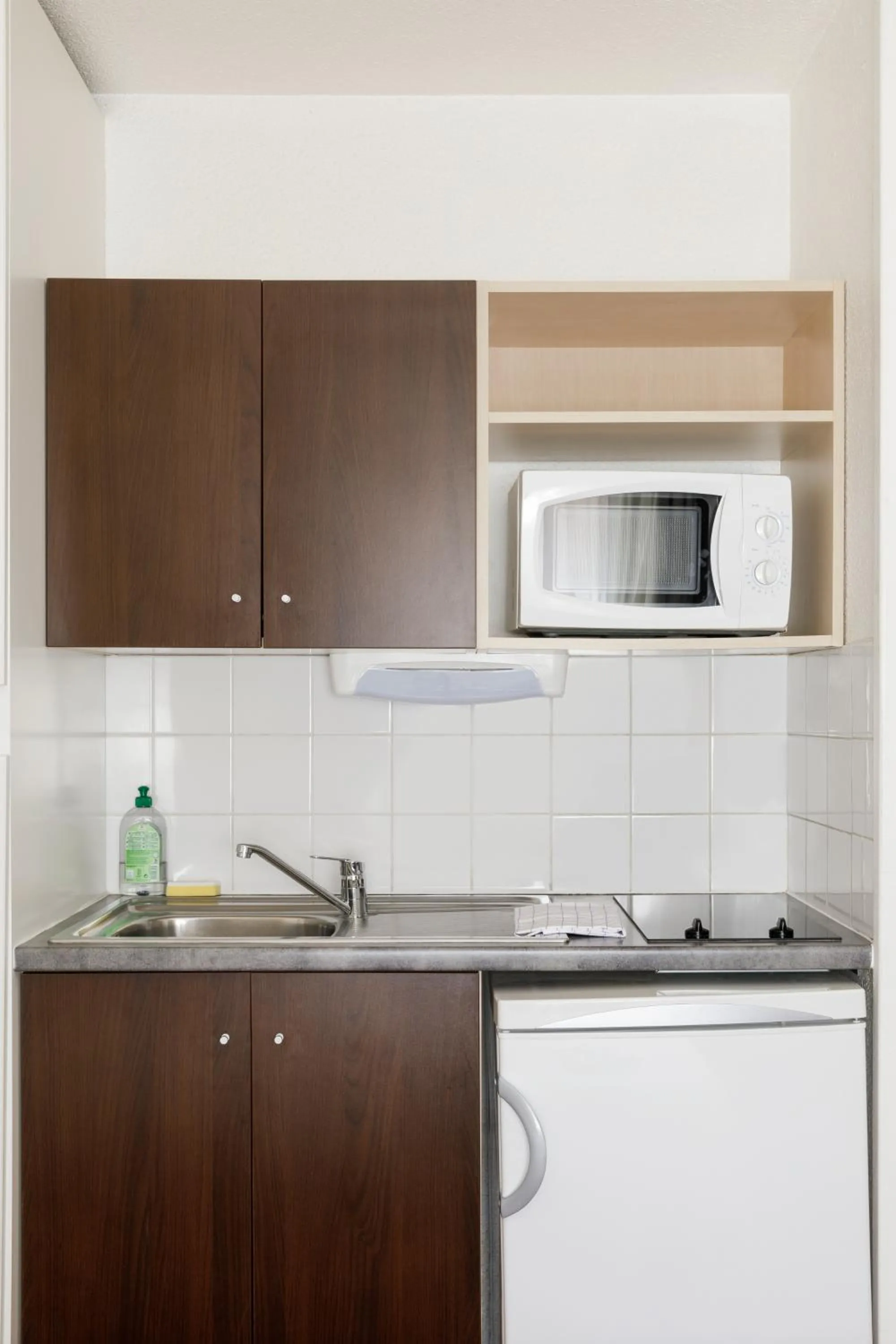 Kitchen or kitchenette in Aparthotel Adagio Access Lille Vauban