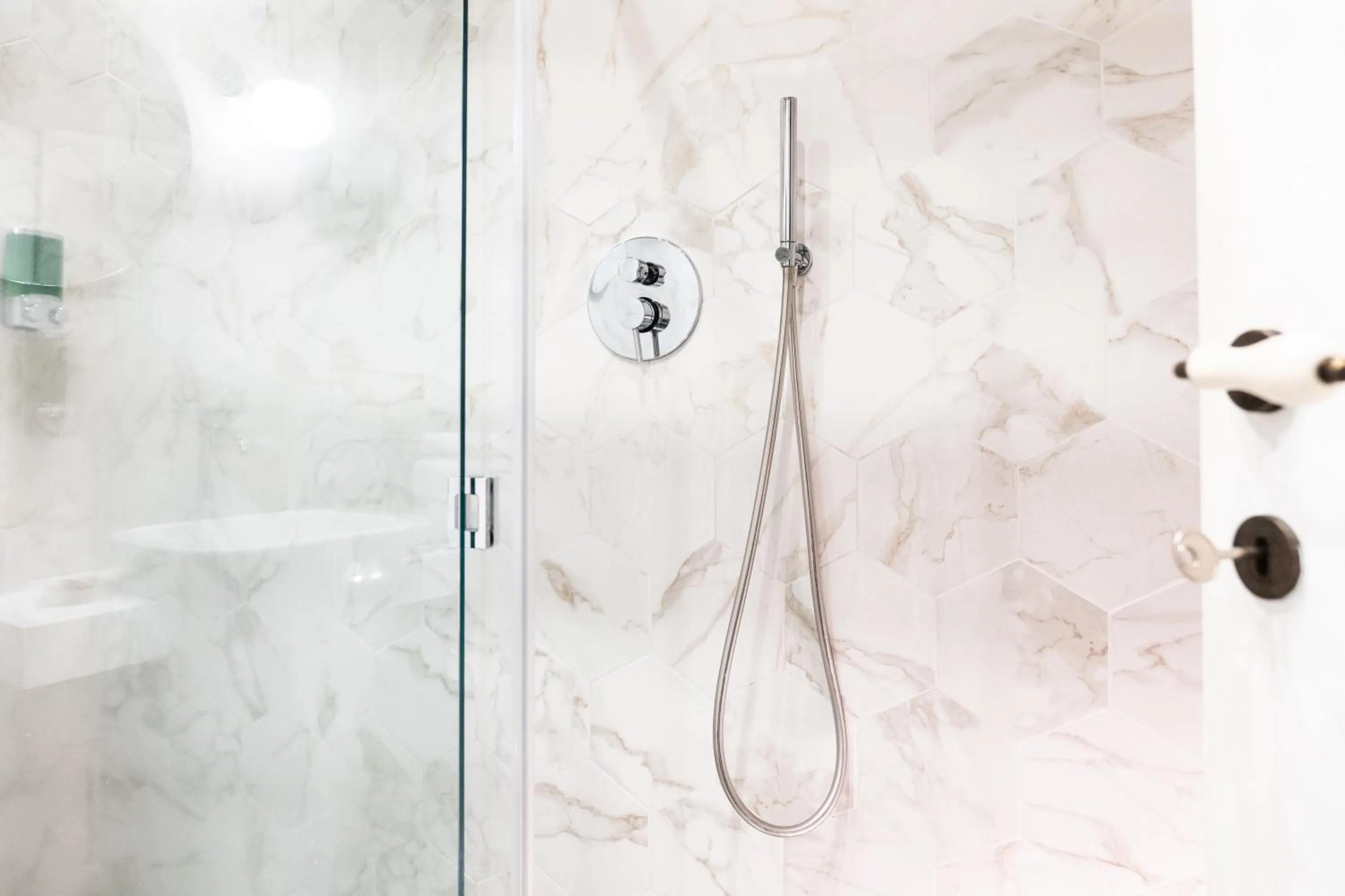 Shower in Scene Suites Apartments