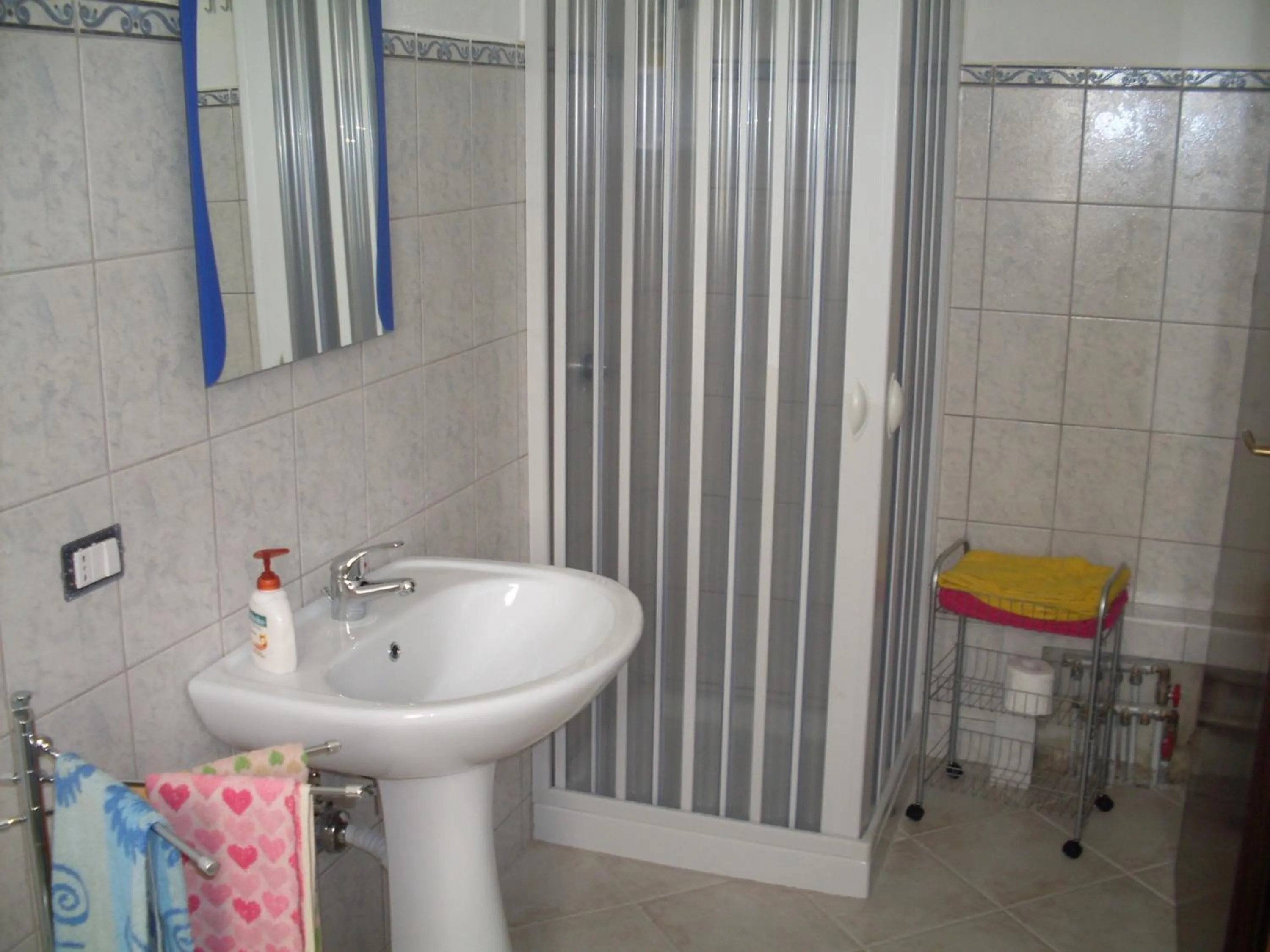 Bathroom in Affittacamere Peonia