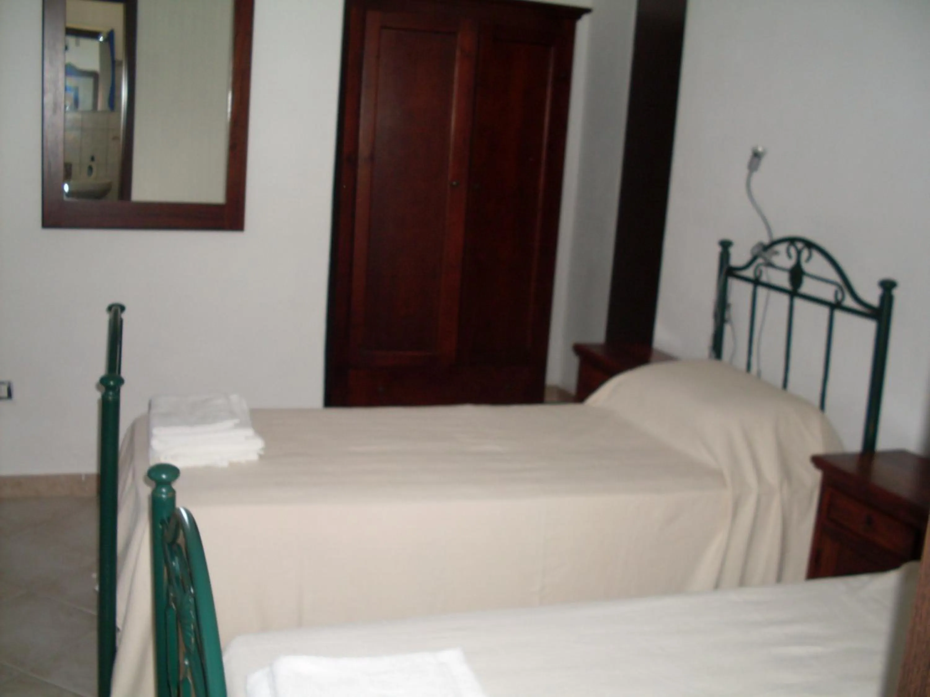 Photo of the whole room, Bed in Affittacamere Peonia