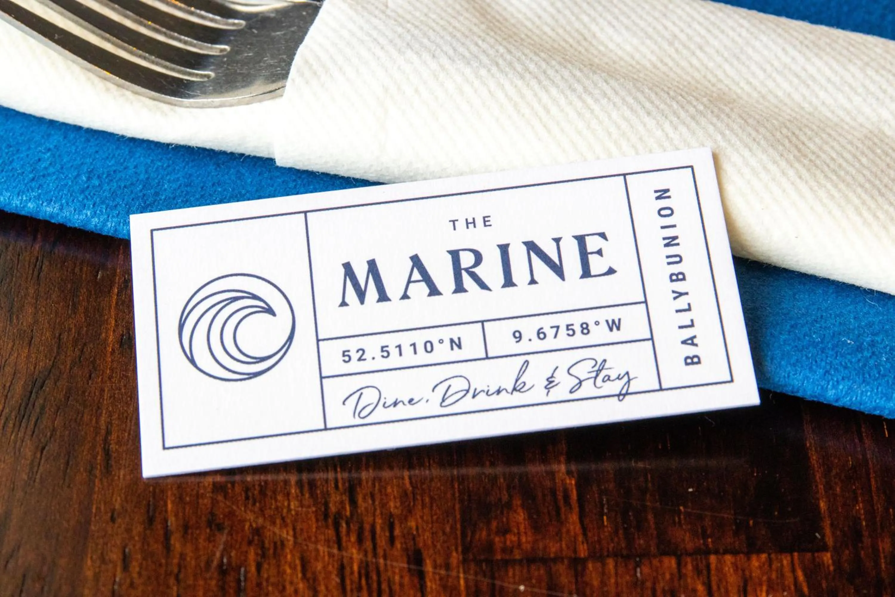 Property logo or sign in Rooms at The Marine