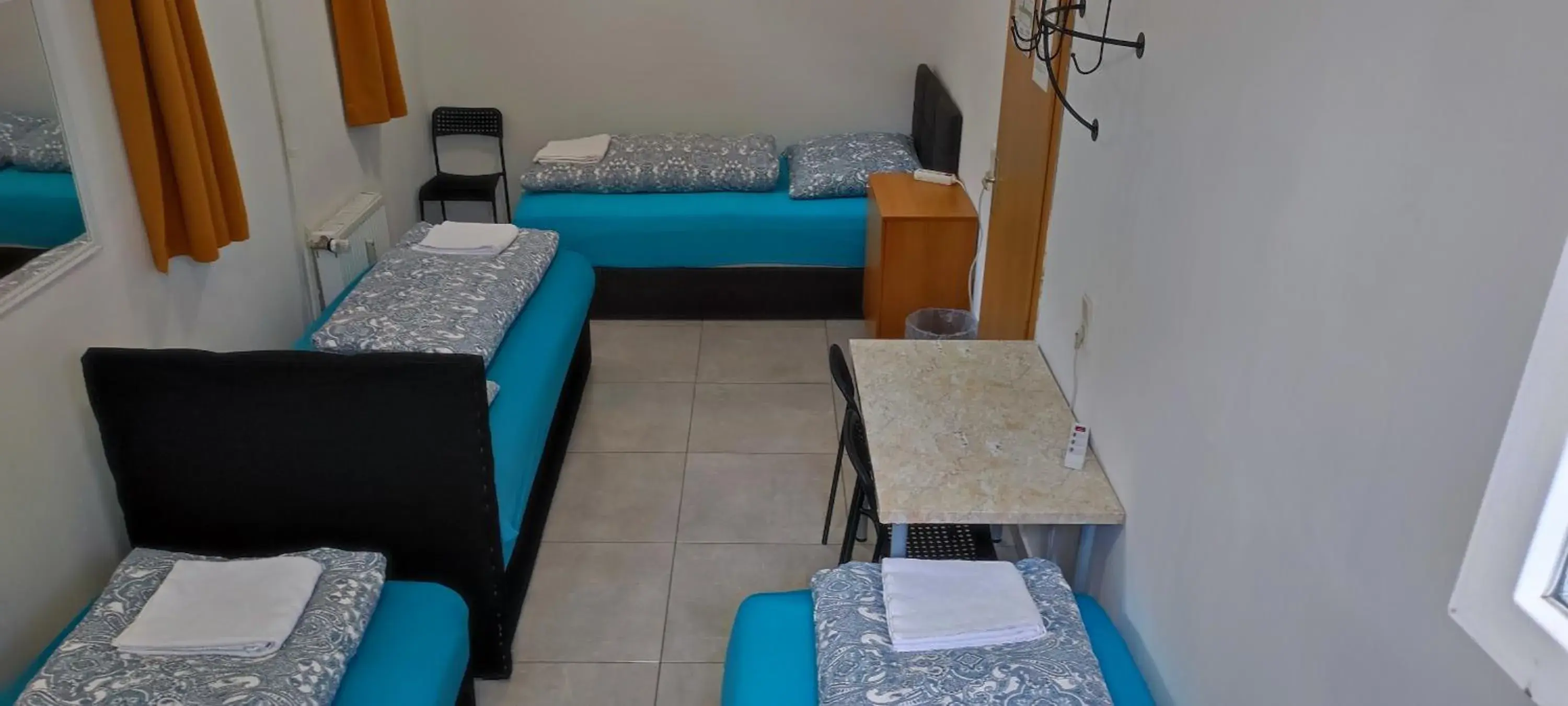 Economy Quadruple Room with Shared Bathroom - single occupancy in The Hostel Economy Quadruple Room with Shared Bathroom - single occupancy in The Hostel