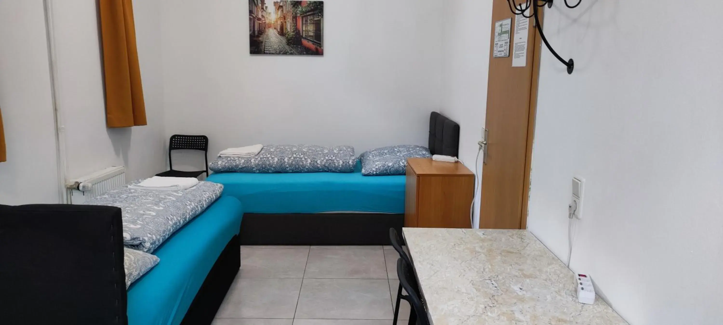 Basic Triple Room with Shared Bathroom in The Hostel Basic Triple Room with Shared Bathroom in The Hostel