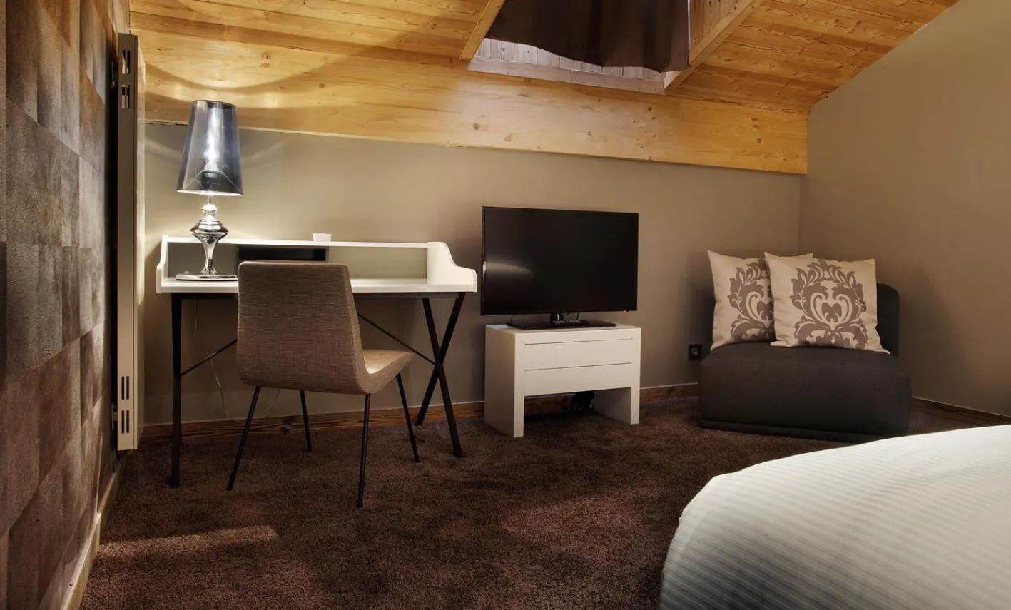 Bed in Hôtel Koh-I Nor by Les Etincelles