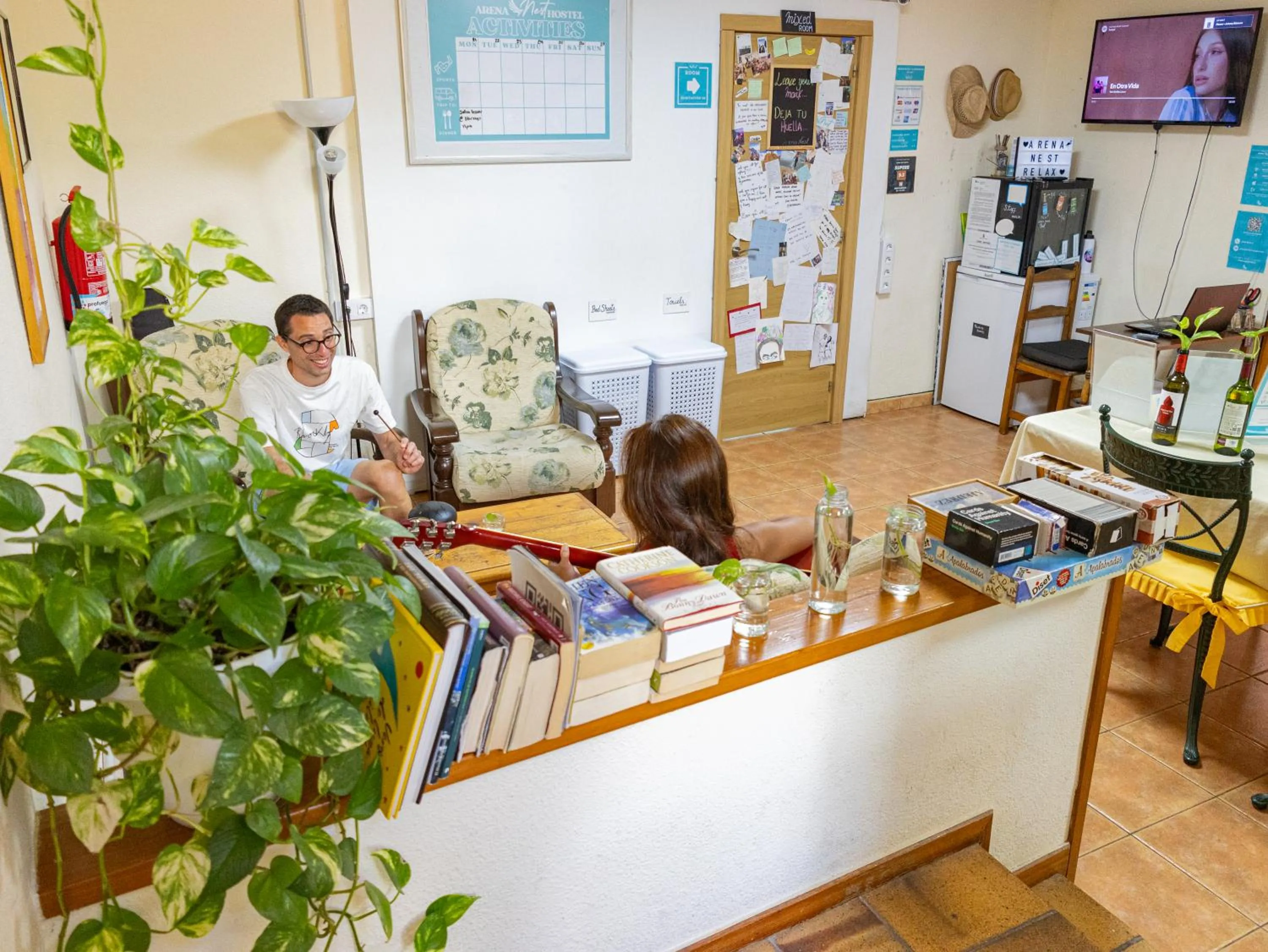 Communal lounge/ TV room in Arena Nest Hostel
