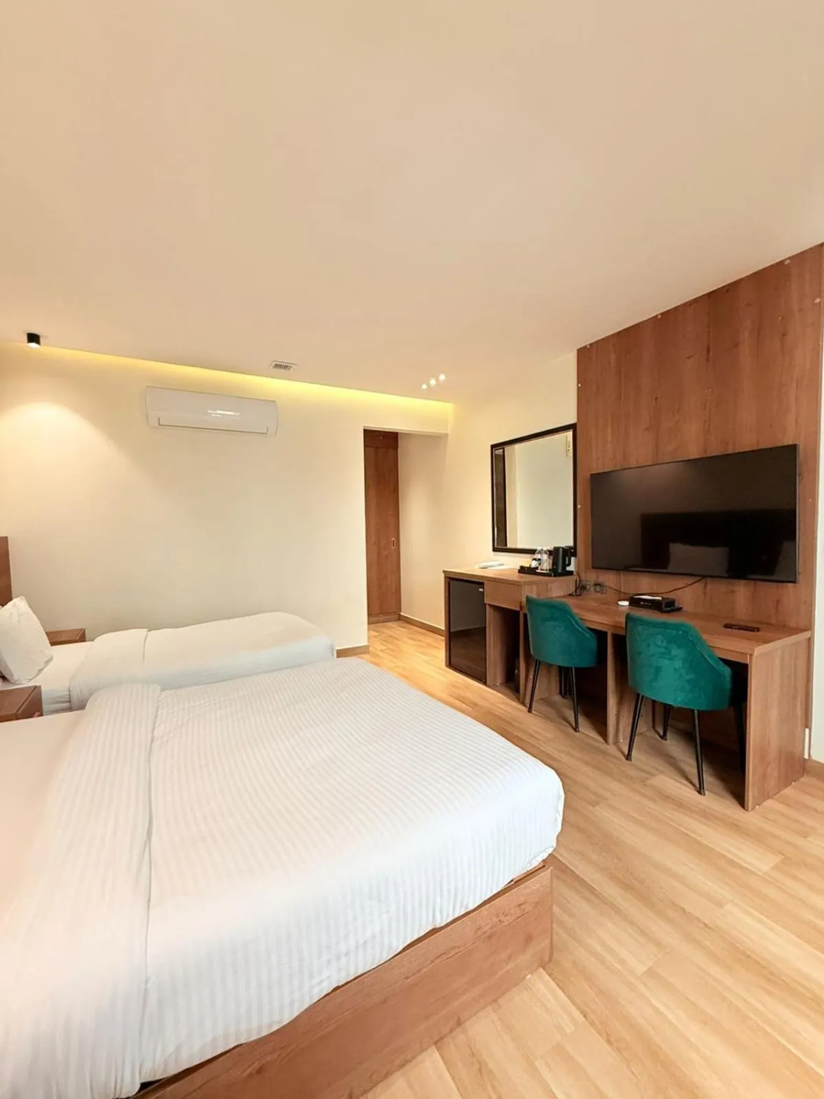 Communal lounge/ TV room, Bed in Hamsun Shahrah-e-Faisal