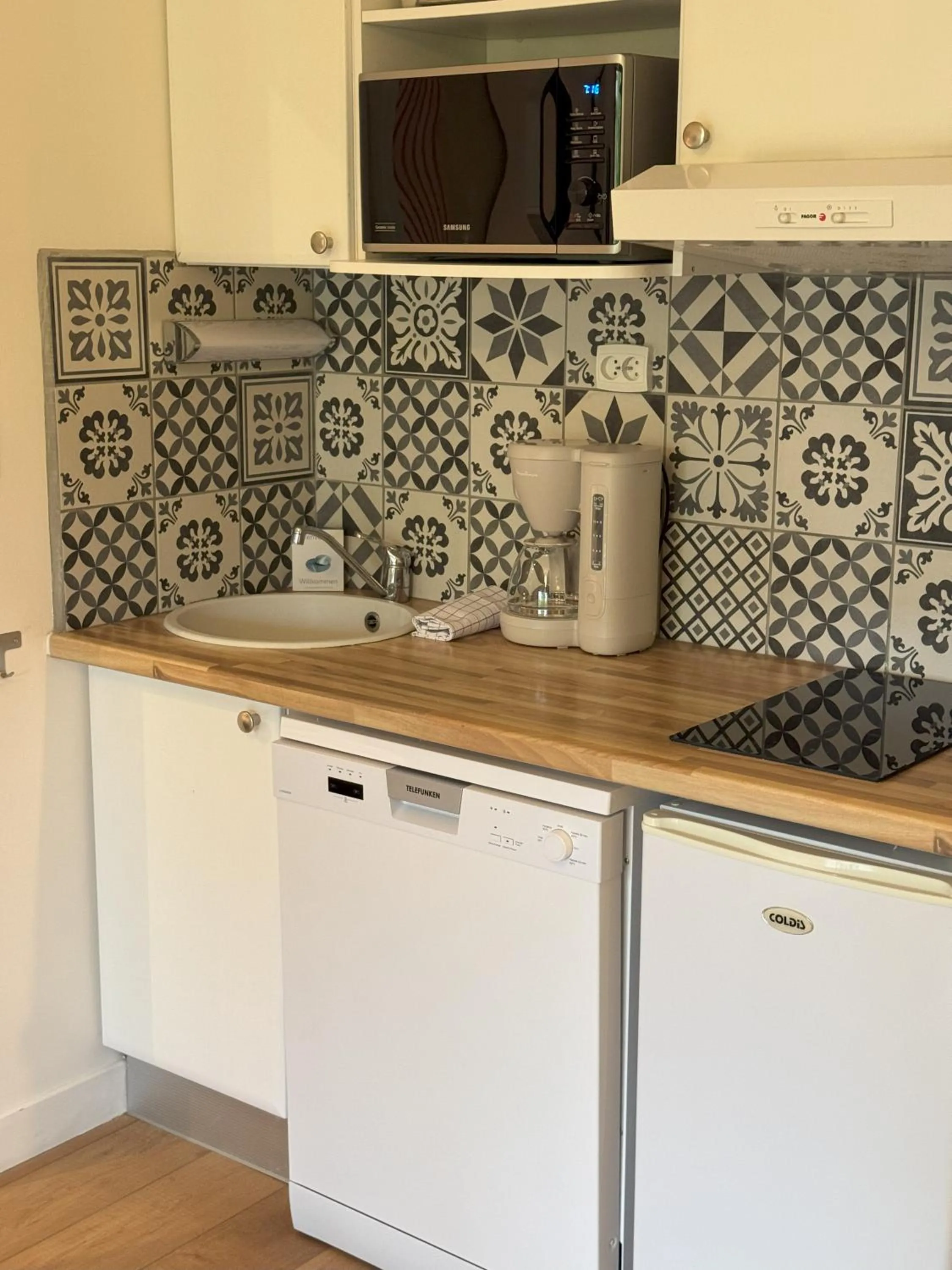 Kitchen or kitchenette in Les Cottages Du Lac