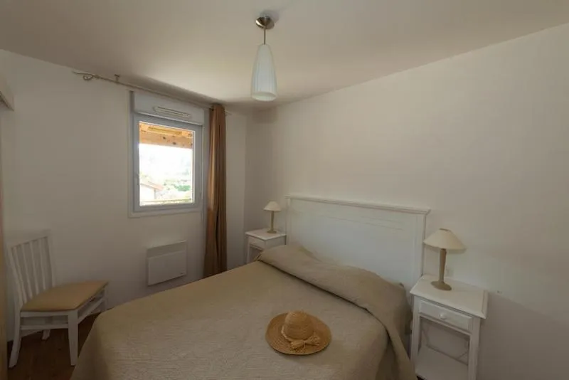 Bedroom, Bed in Les Cottages Du Lac