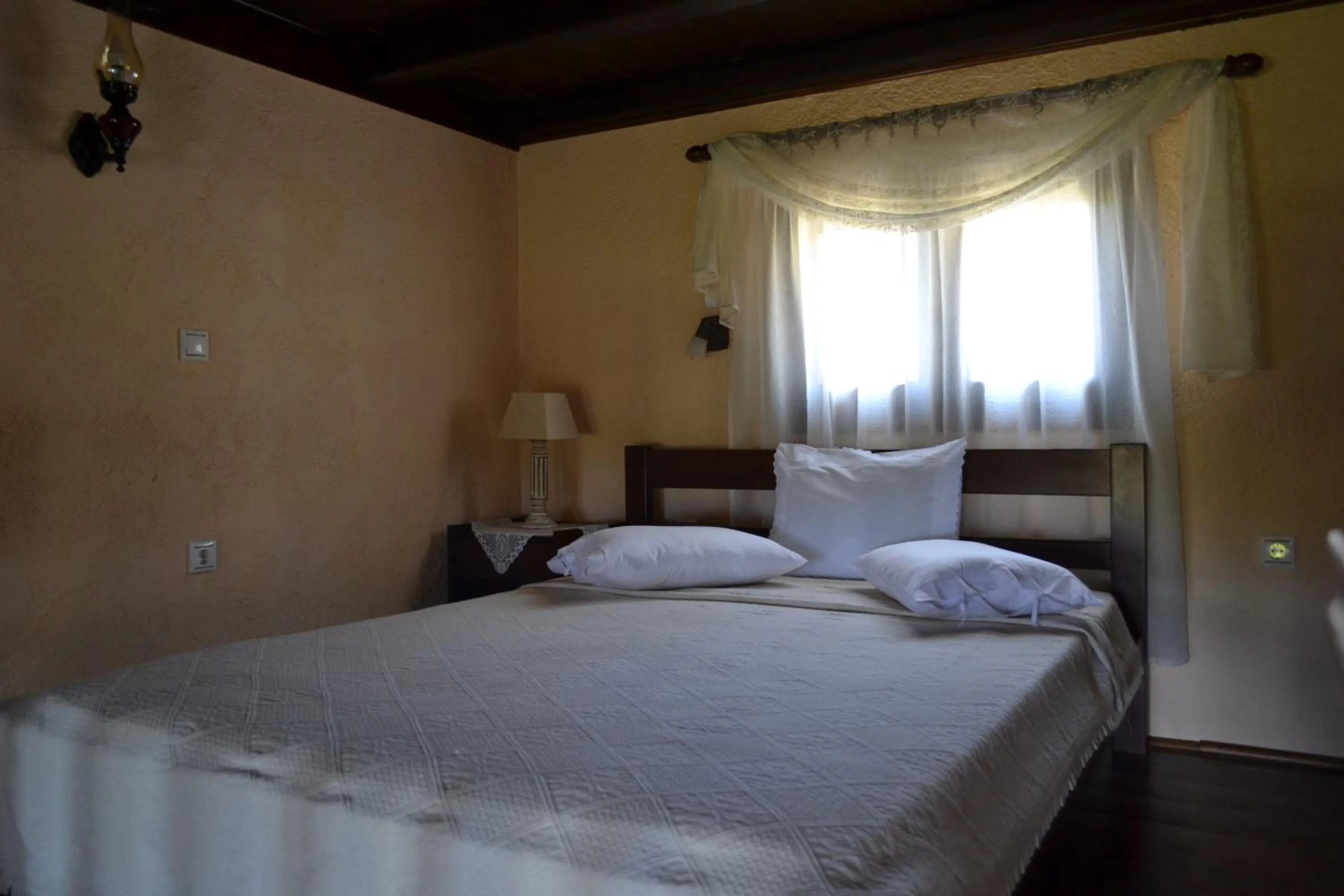 Bed in Katerina Apartments