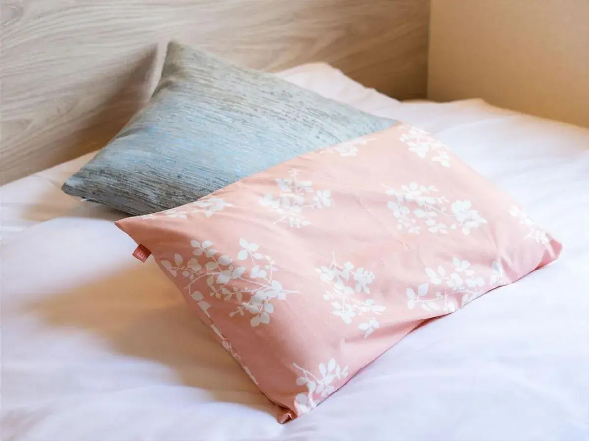 Bed in Super Hotel Premier Saitama Higashiguchi Bed in Super Hotel Premier Saitama Higashiguchi