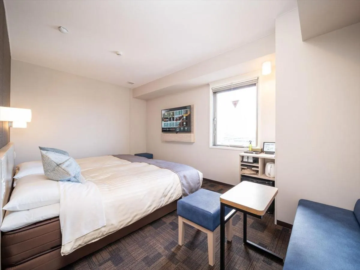 Bed in Super Hotel Premier Saitama Higashiguchi