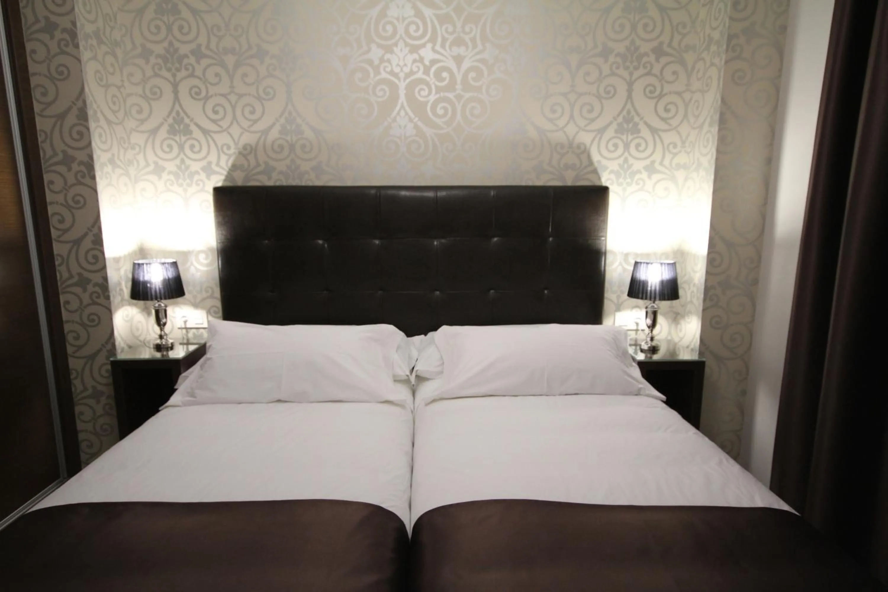 Bed in Alvear Suites