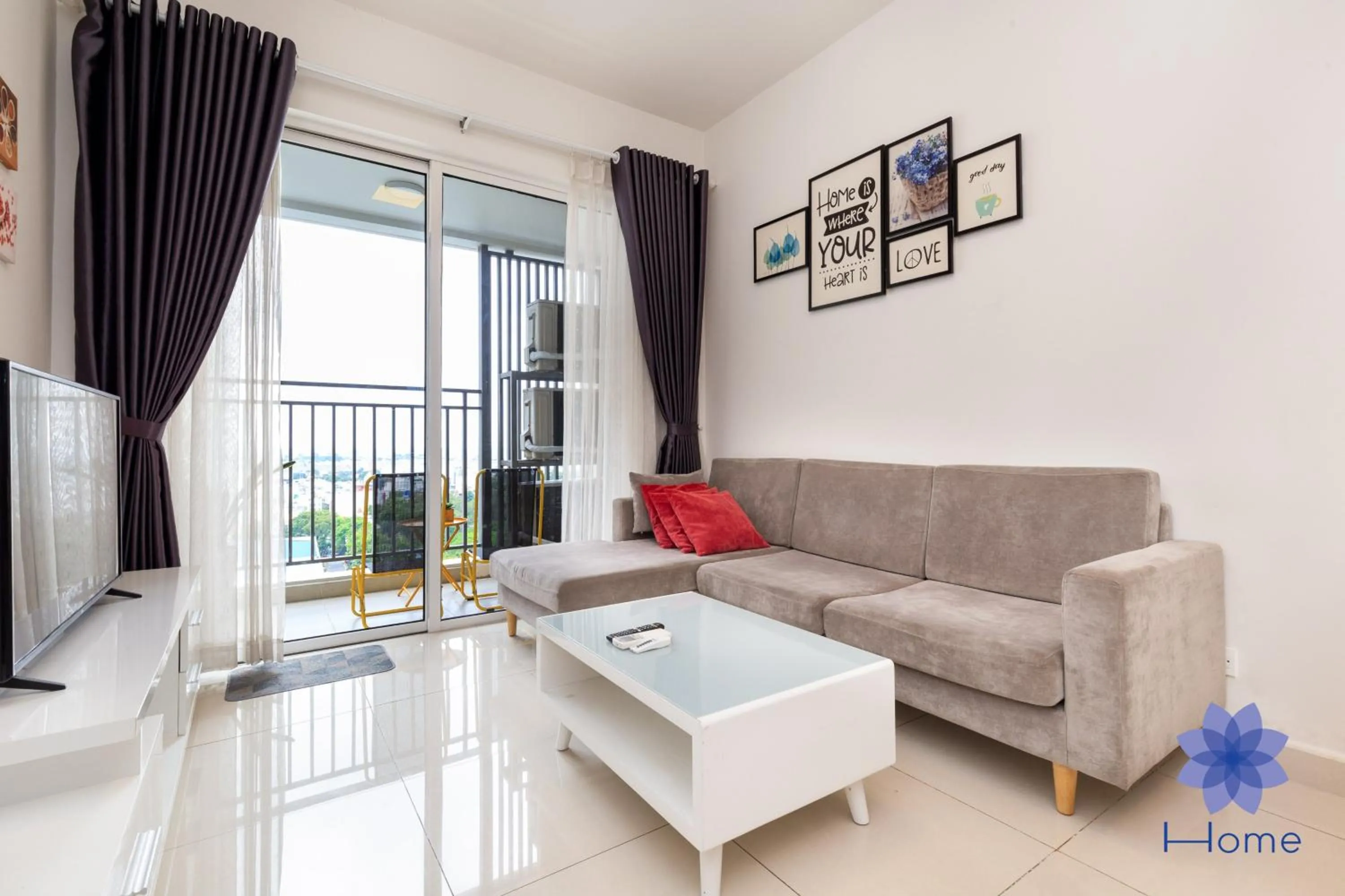 TV and multimedia in iHome Furnished Apartments with Free Gym & Pool, Airport Pick-Up Service