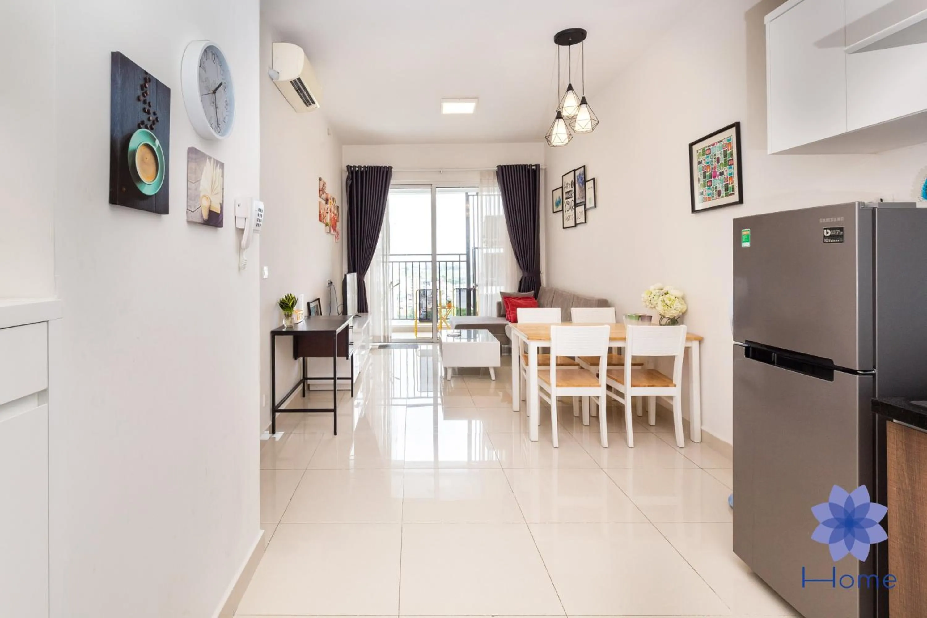 TV and multimedia in iHome Furnished Apartments with Free Gym & Pool, Airport Pick-Up Service