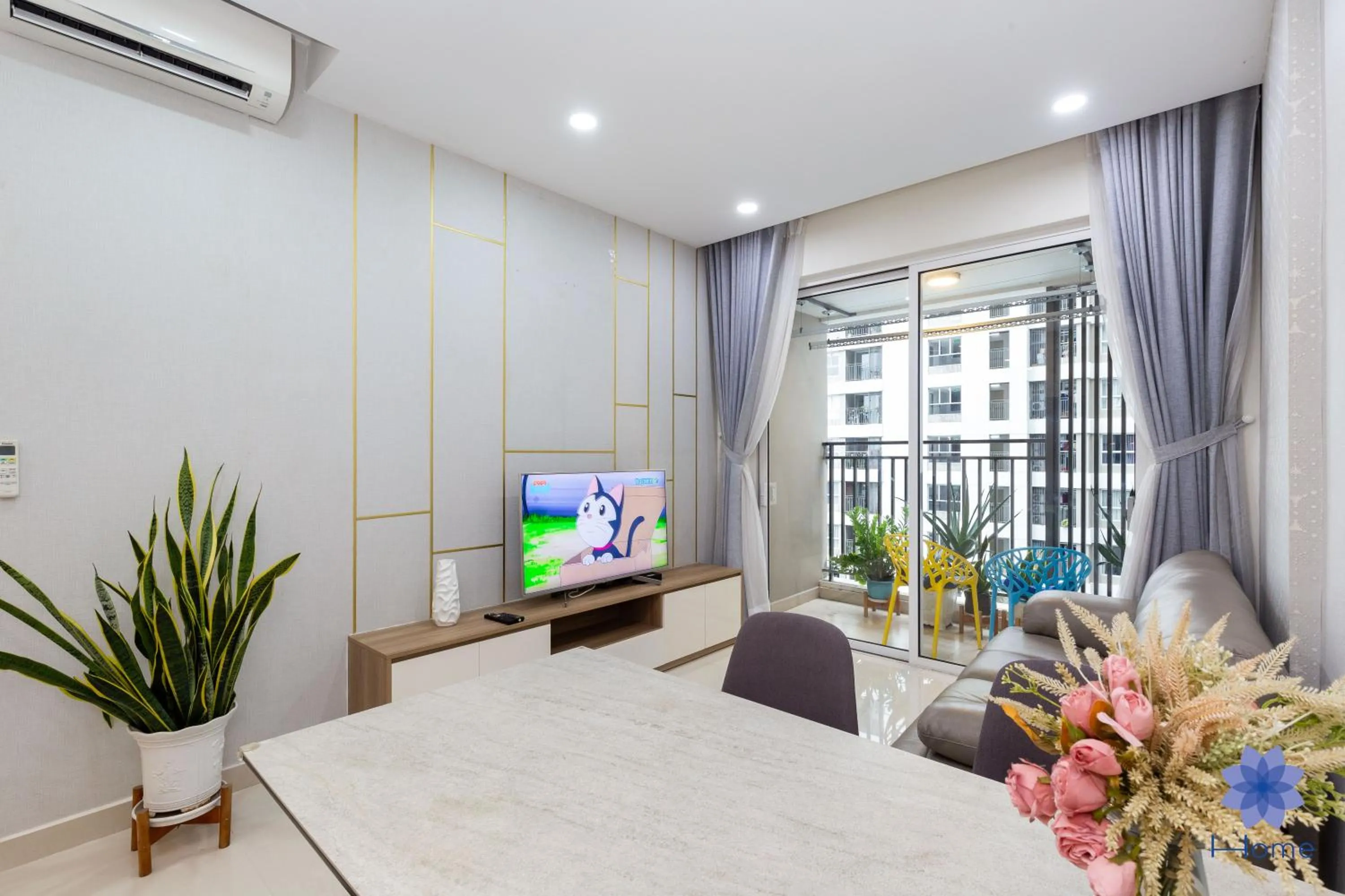 Living room in iHome Furnished Apartments with Free Gym & Pool, Airport Pick-Up Service
