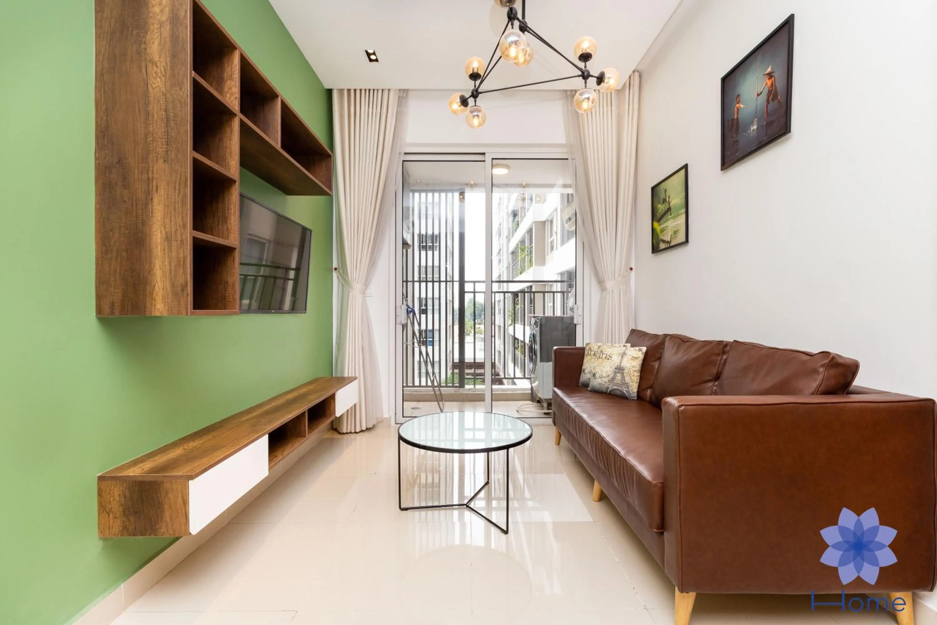 Living room in iHome Furnished Apartments with Free Gym & Pool, Airport Pick-Up Service