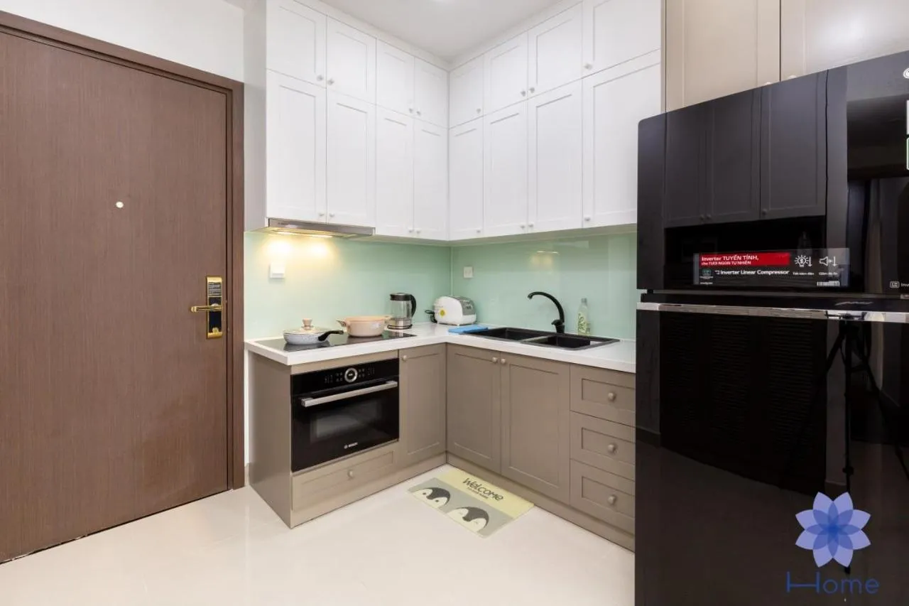 Kitchen or kitchenette in iHome Furnished Apartments with Free Gym & Pool, Airport Pick-Up Service