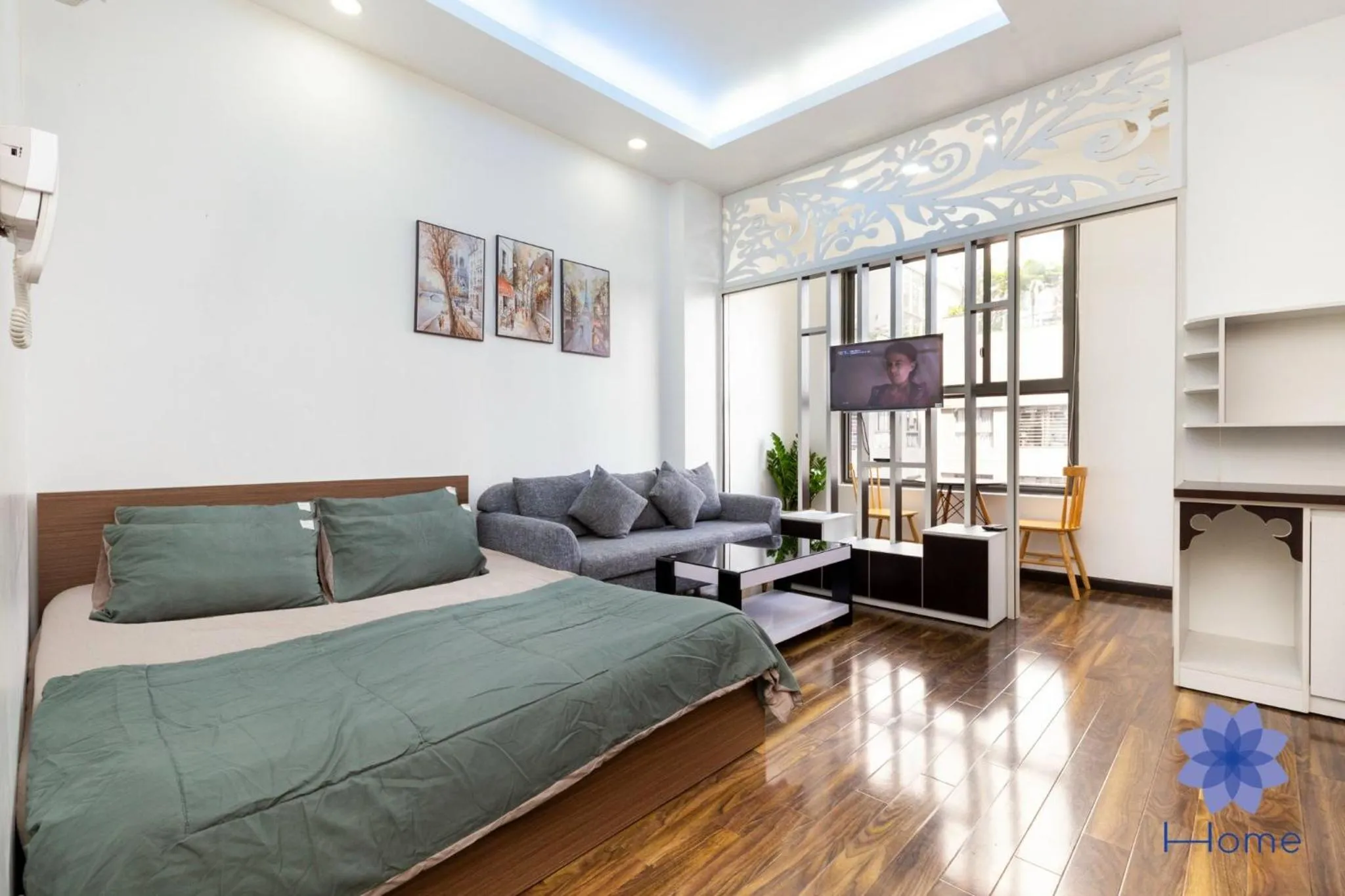 Living room, Bed in iHome Furnished Apartments with Free Gym & Pool, Airport Pick-Up Service