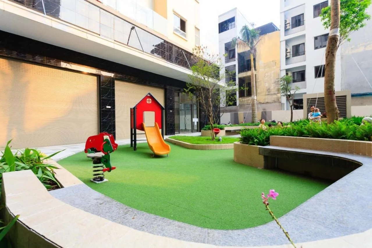 Children play ground in iHome Furnished Apartments with Free Gym & Pool, Airport Pick-Up Service