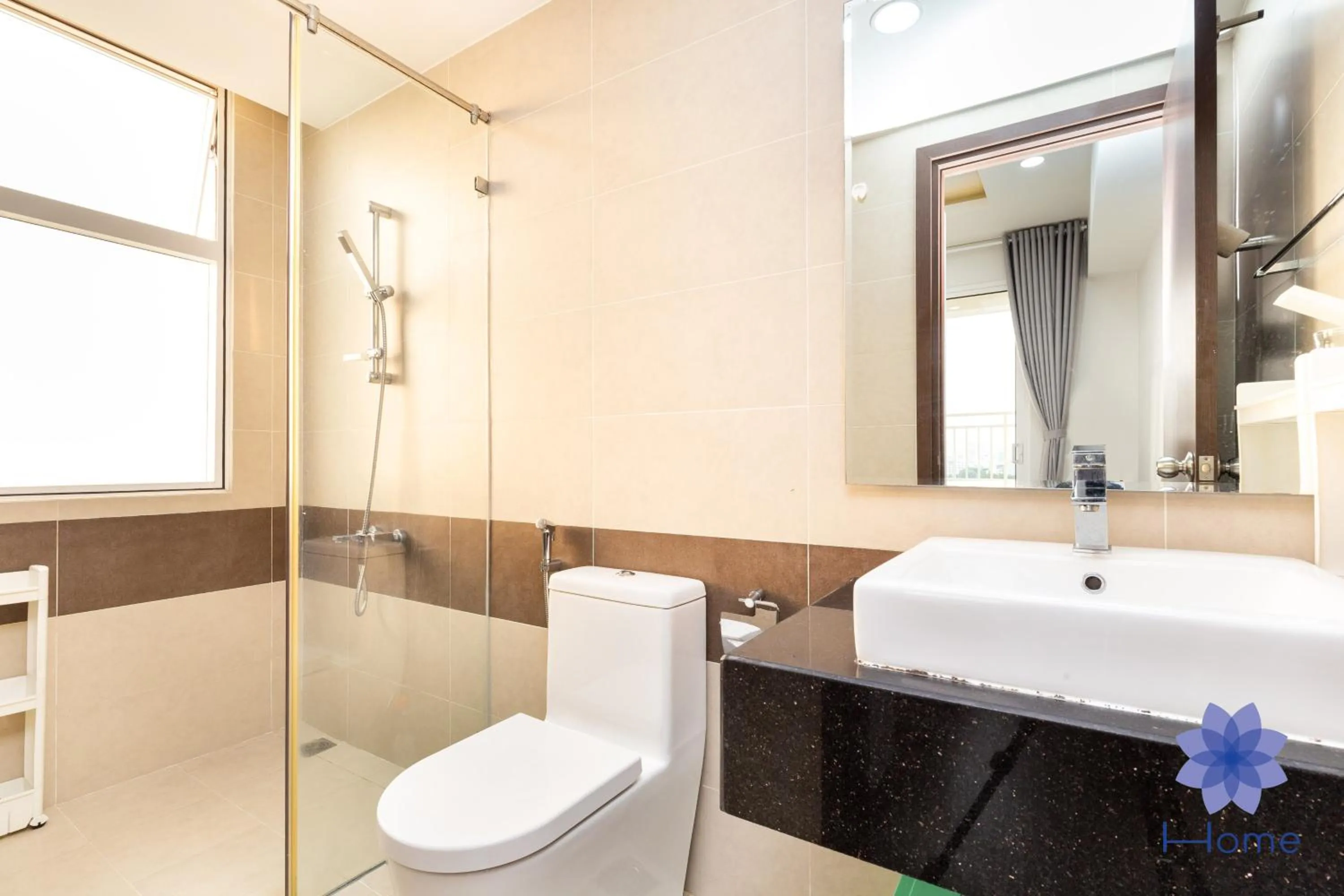 Bathroom in iHome Furnished Apartments with Free Gym & Pool, Airport Pick-Up Service
