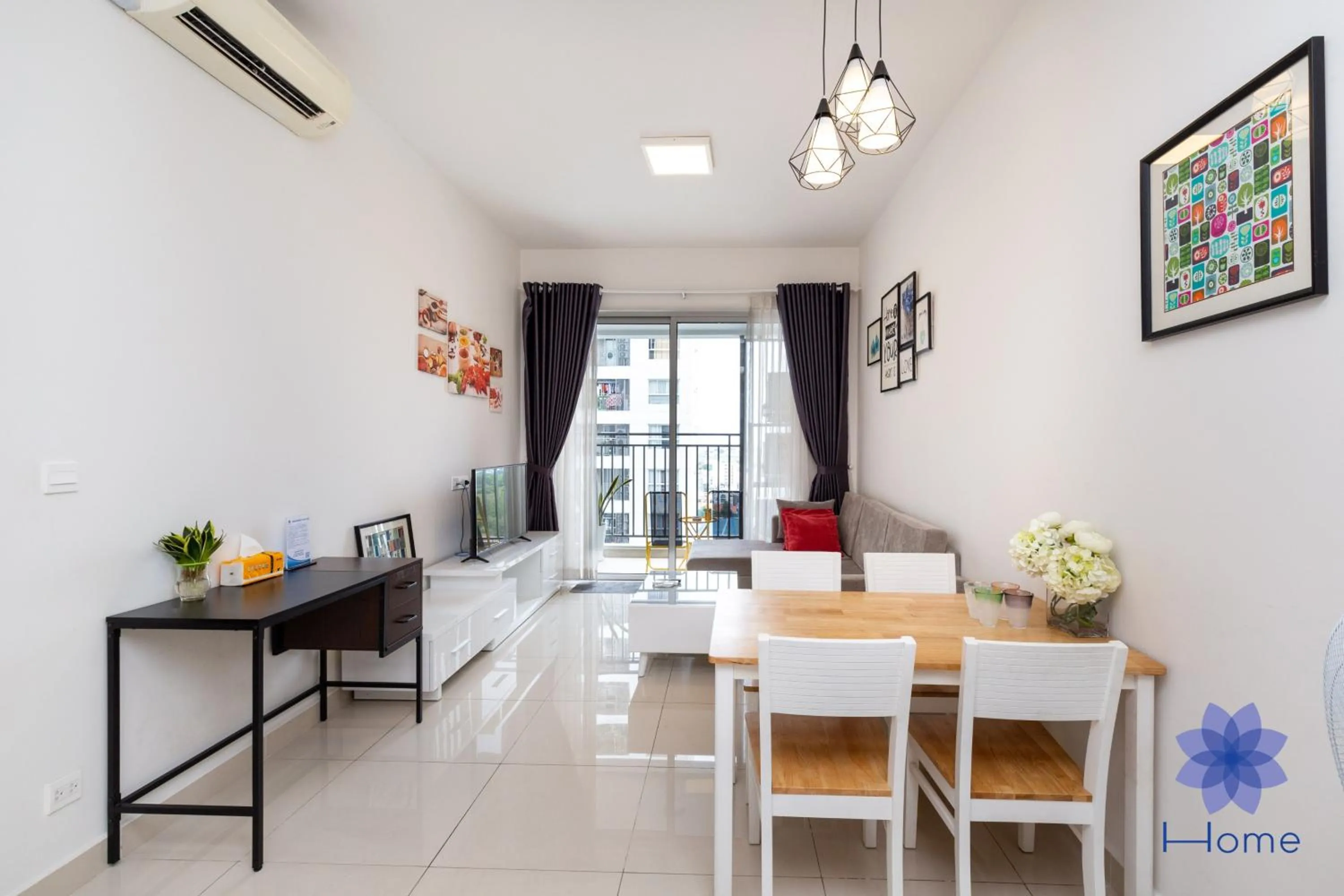 Living room in iHome Furnished Apartments with Free Gym & Pool, Airport Pick-Up Service