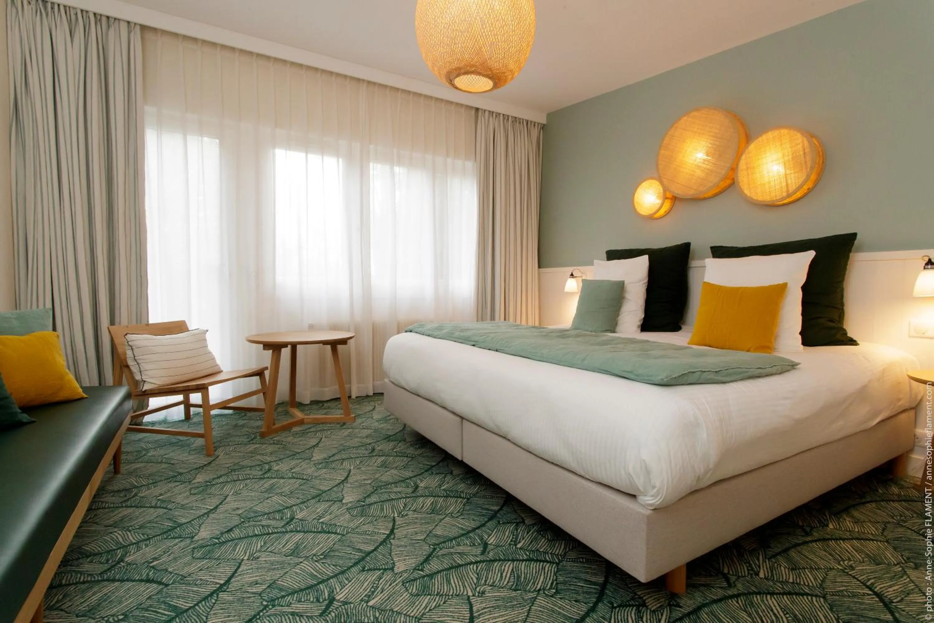 Bed in Le Manoir Hôtel Le Touquet Paris Plage