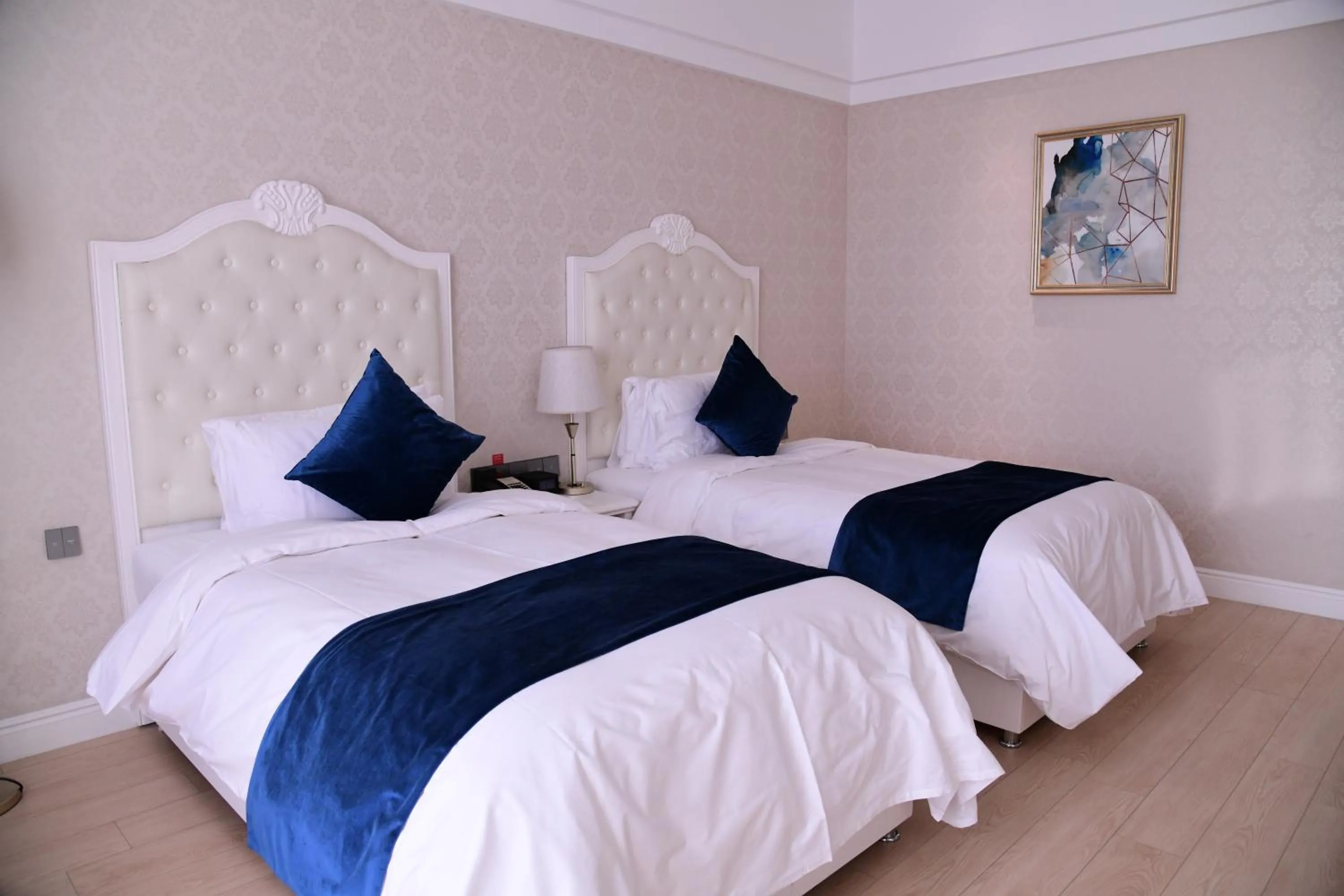 Bed in GUOCE Beijing Capital Airport Hotel & Convention Center