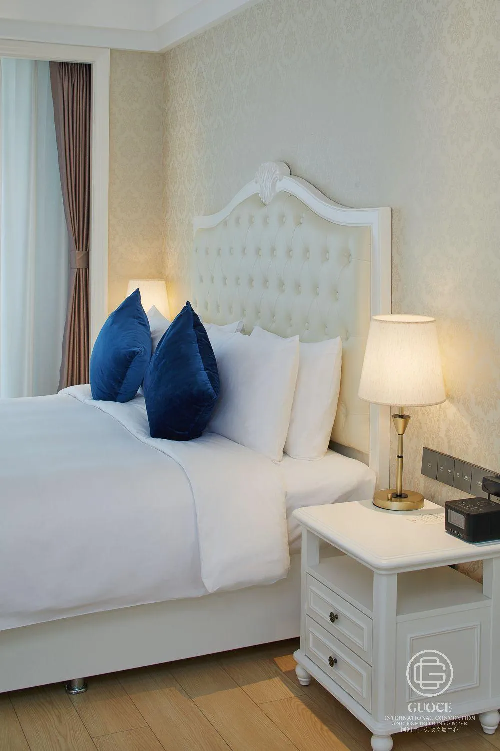 Bed in GUOCE Beijing Capital Airport Hotel & Convention Center