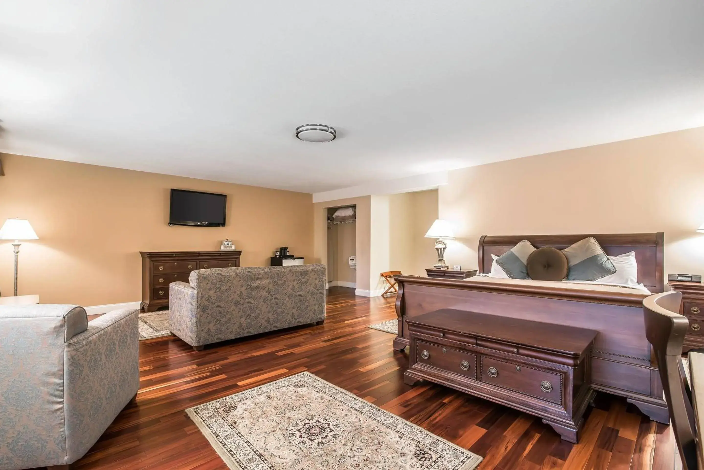 Bedroom in Riverside Hotel, an Ascend Collection Hotel Bedroom in Riverside Hotel, an Ascend Collection Hotel
