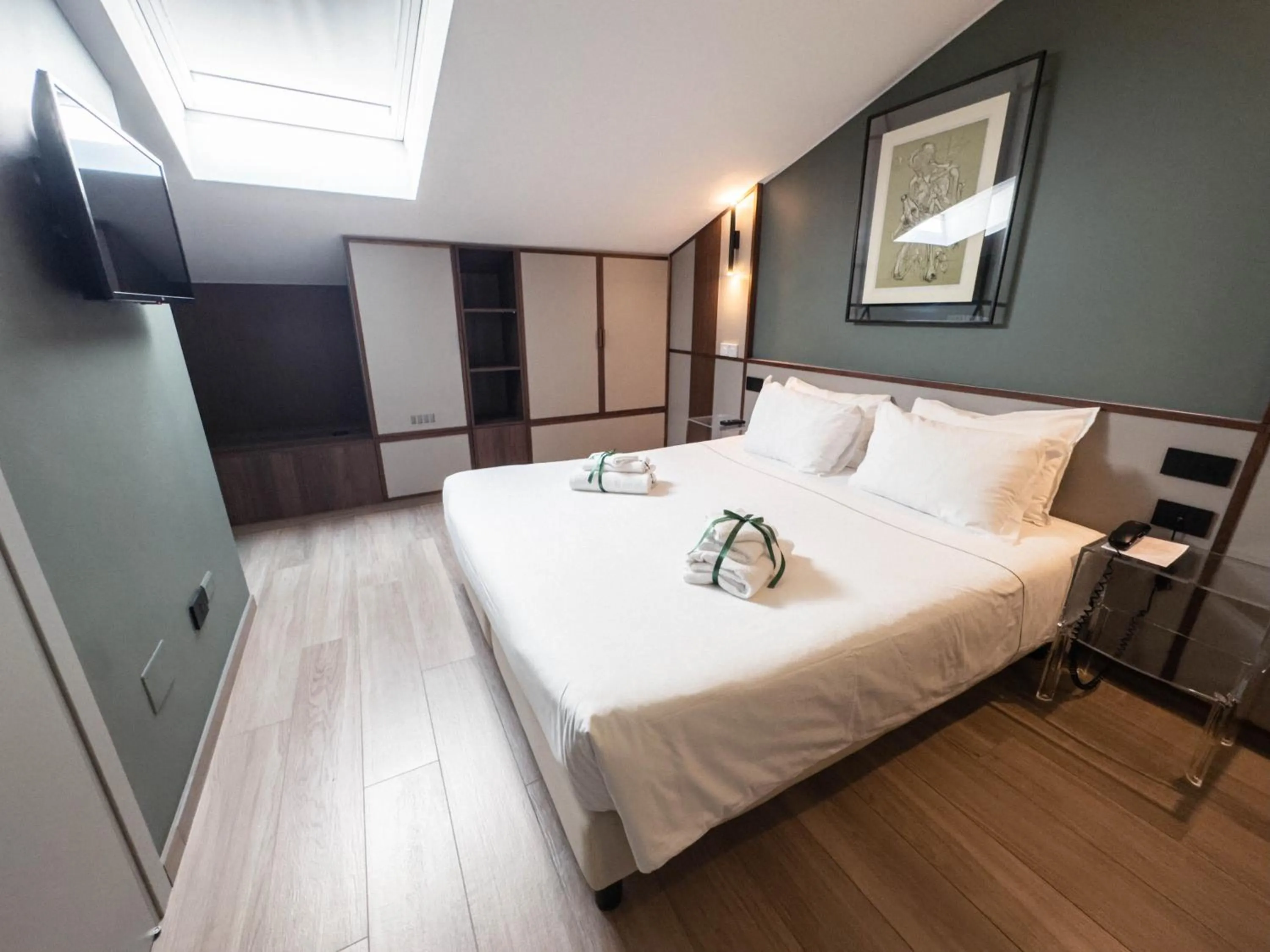 Bed in Hotel Duomo Cremona