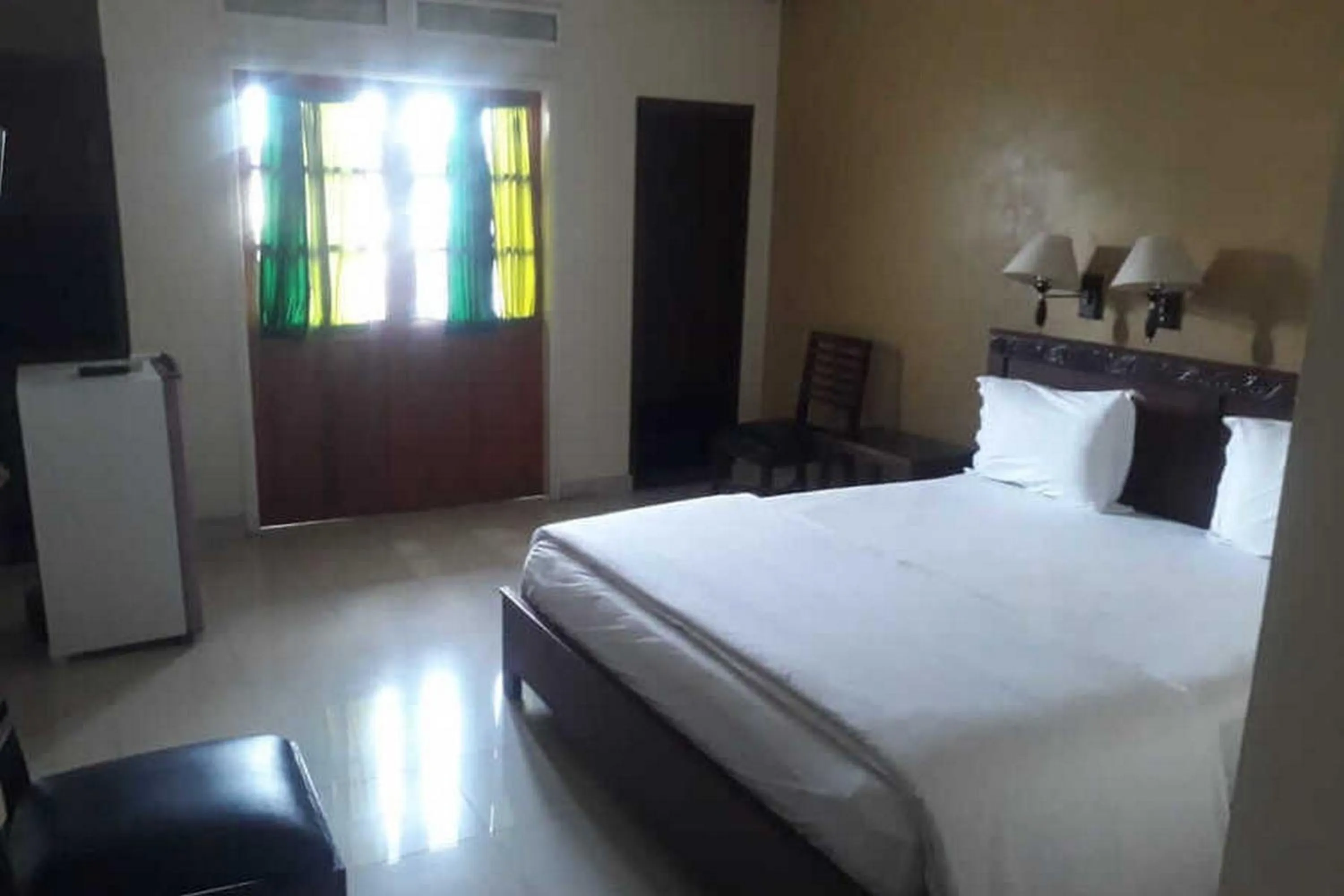 Photo of the whole room, Bed in RedDoorz Brand MAN12045 RedDoorz near Megamall Manado