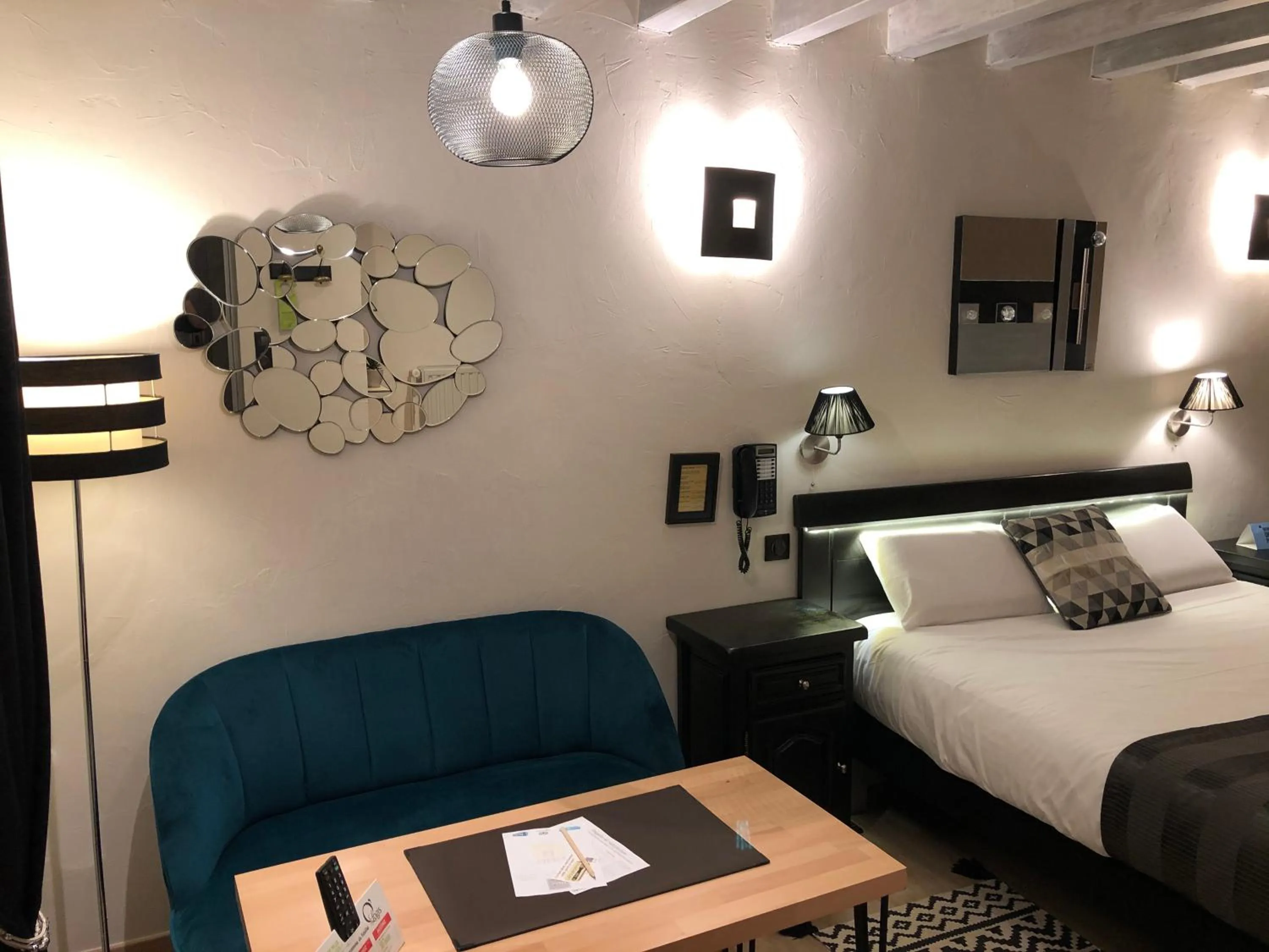 Photo of the whole room, Bed in Logis Hotel Oasis