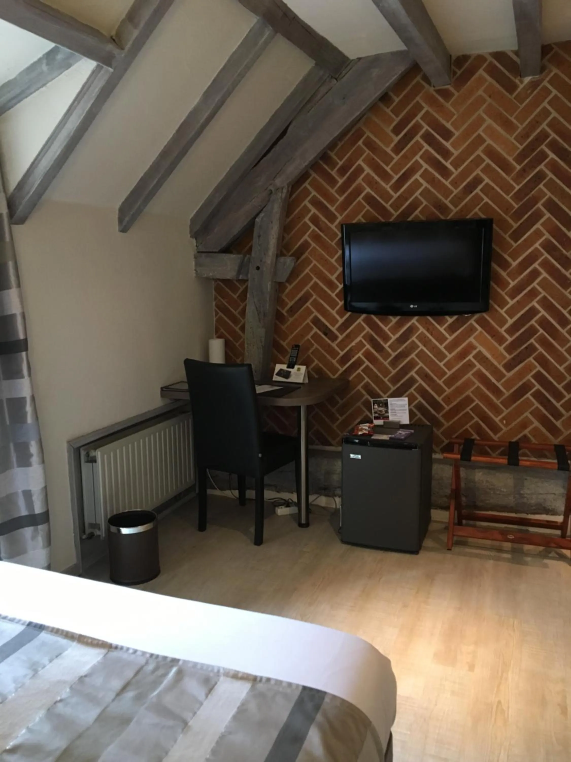 Photo of the whole room, Bed in Logis Hotel Oasis