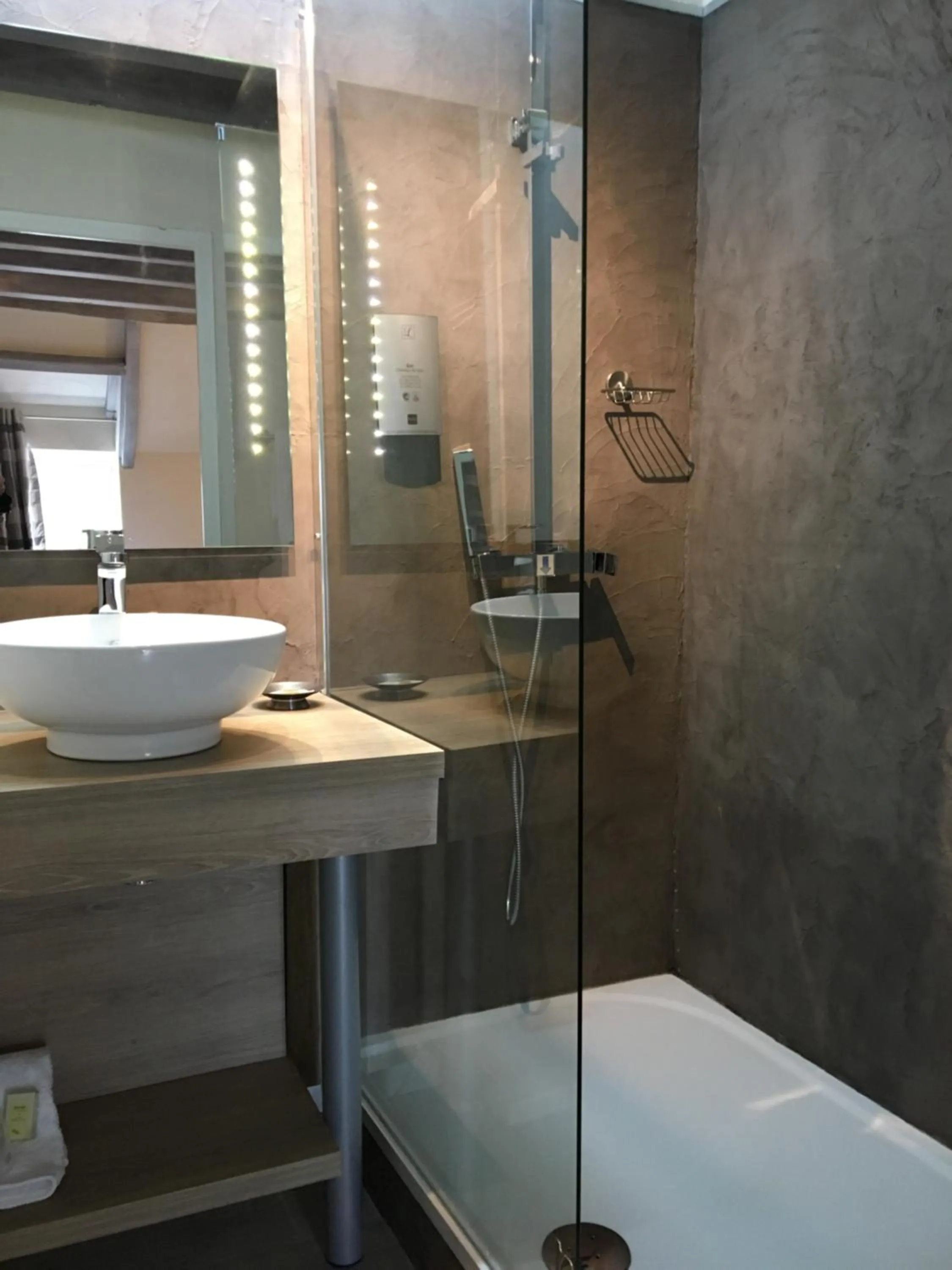 Bathroom in Logis Hotel Oasis