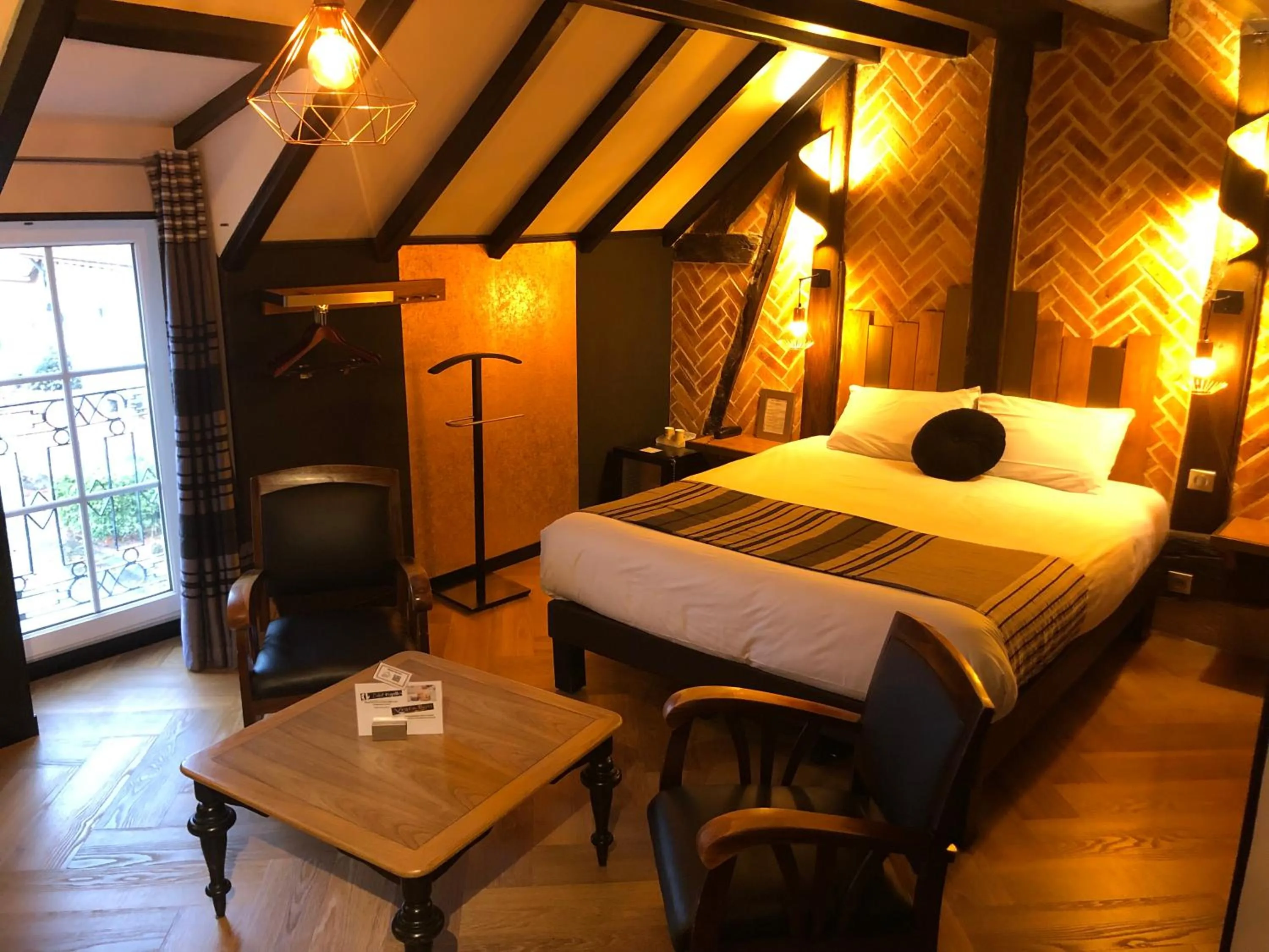 Photo of the whole room, Bed in Logis Hotel Oasis