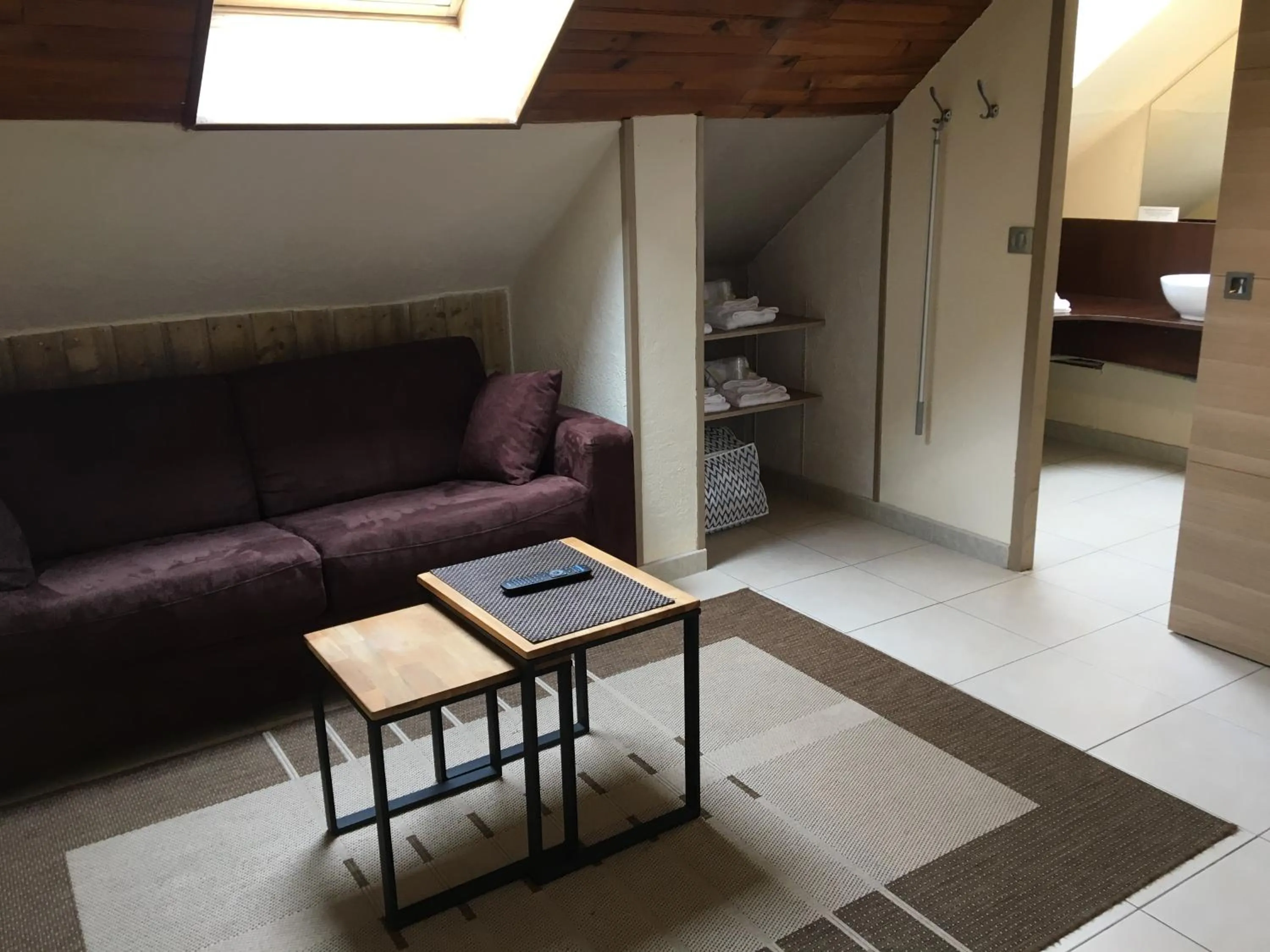 Seating area in Logis Hotel Oasis