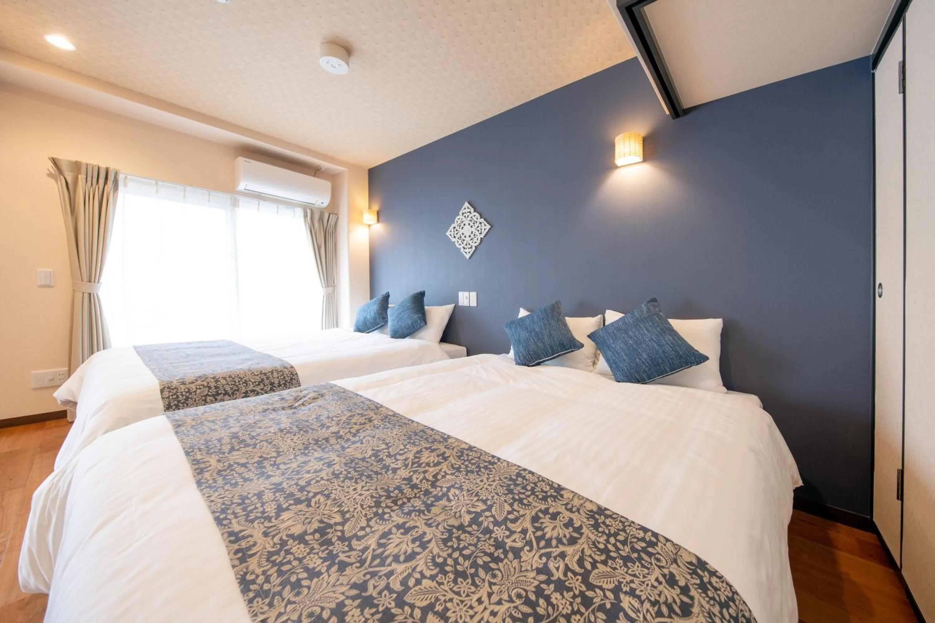 Bed in Hotel Haabesu Okinawa